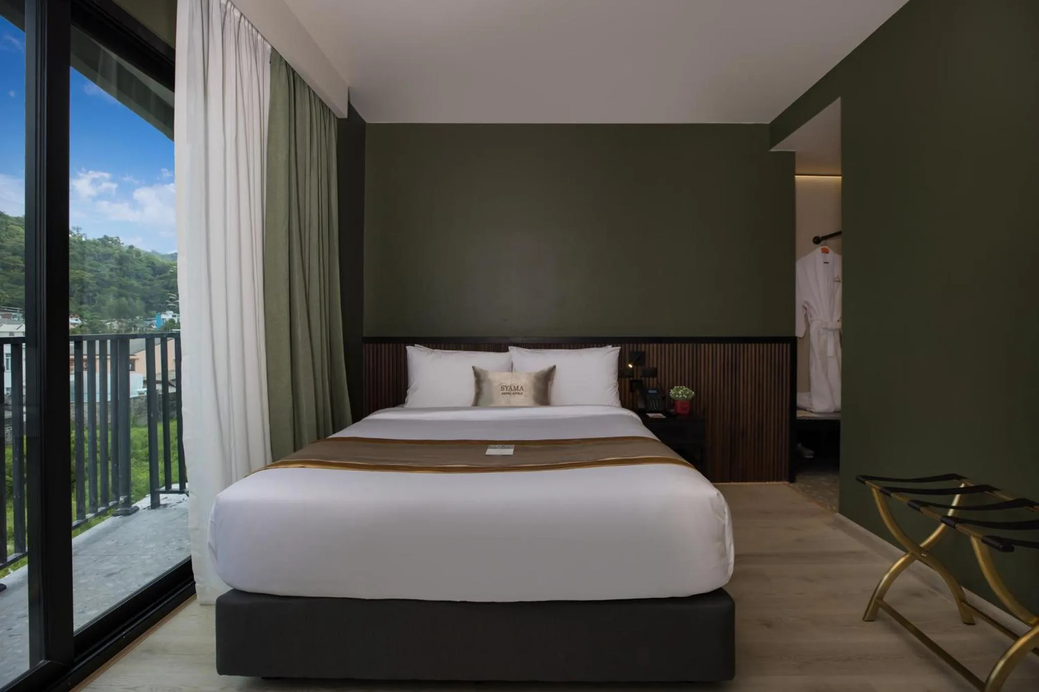 View (from property/room), Bed in Syama Mansion Patong, an Aspira Collection