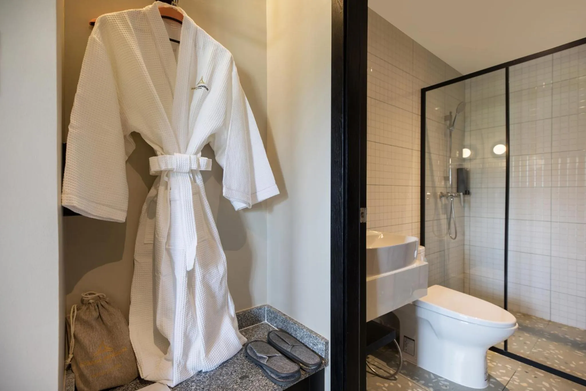 Shower in Syama Mansion Patong, an Aspira Collection