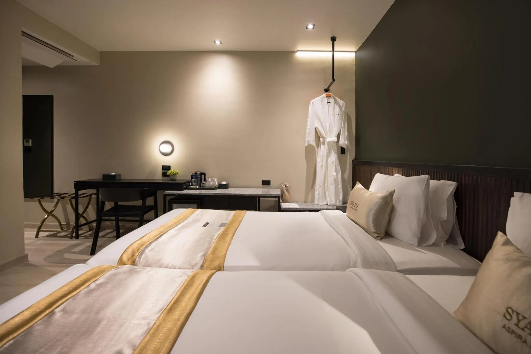 Bed in Syama Mansion Patong, an Aspira Collection