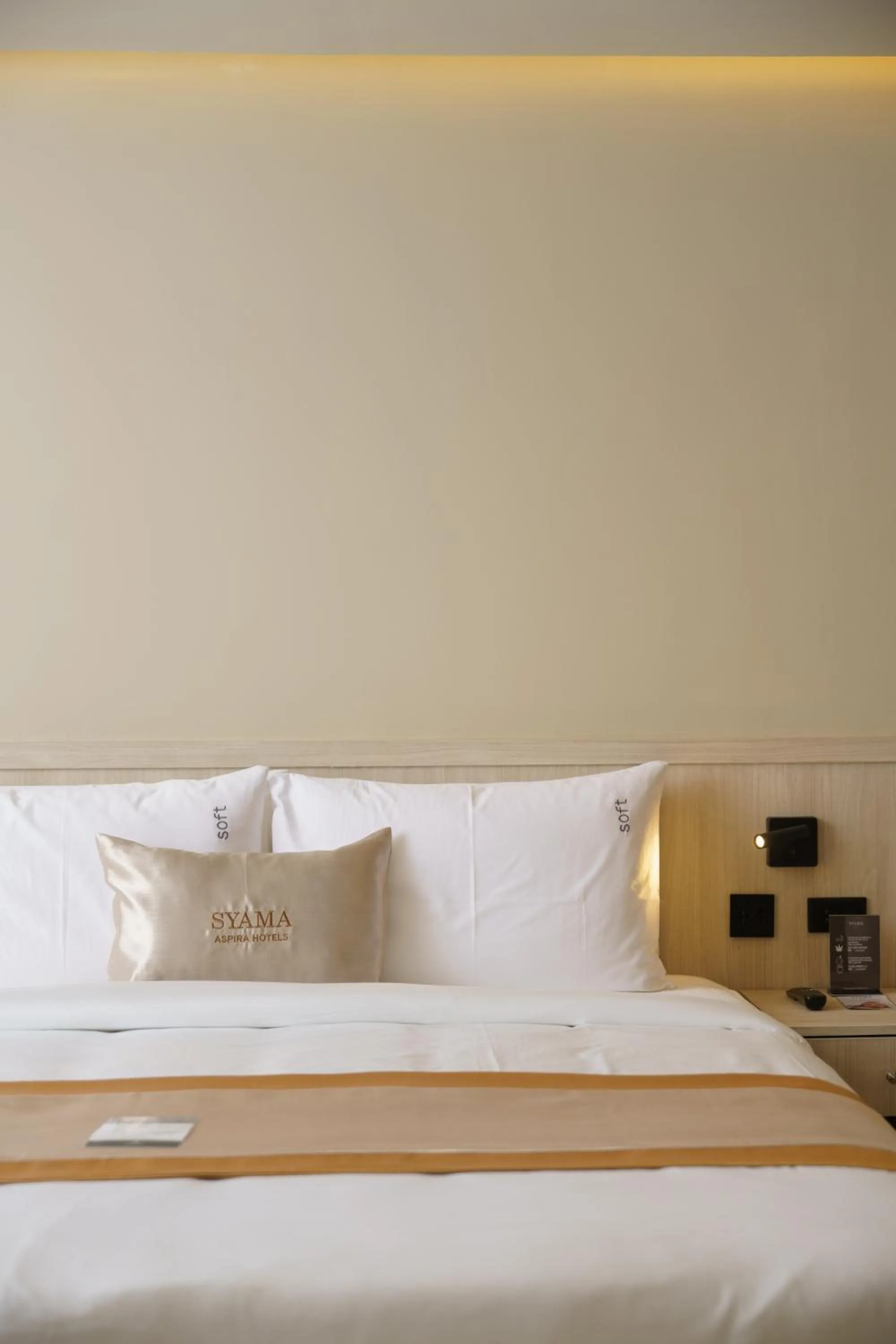 Bed in Syama Mansion Patong, an Aspira Collection