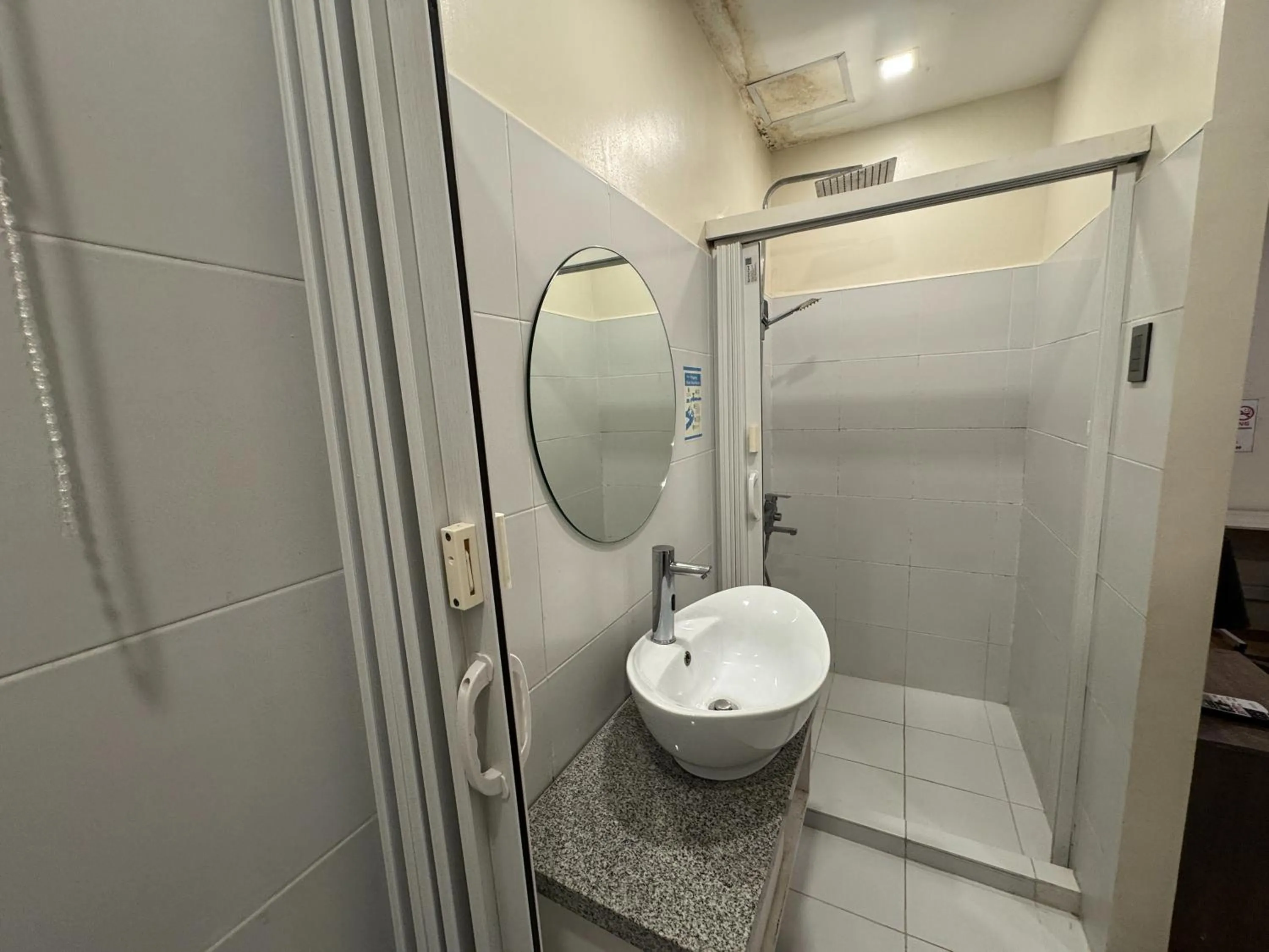 Bathroom in The Circuit Manor Hotel near Ayala Malls Circuit