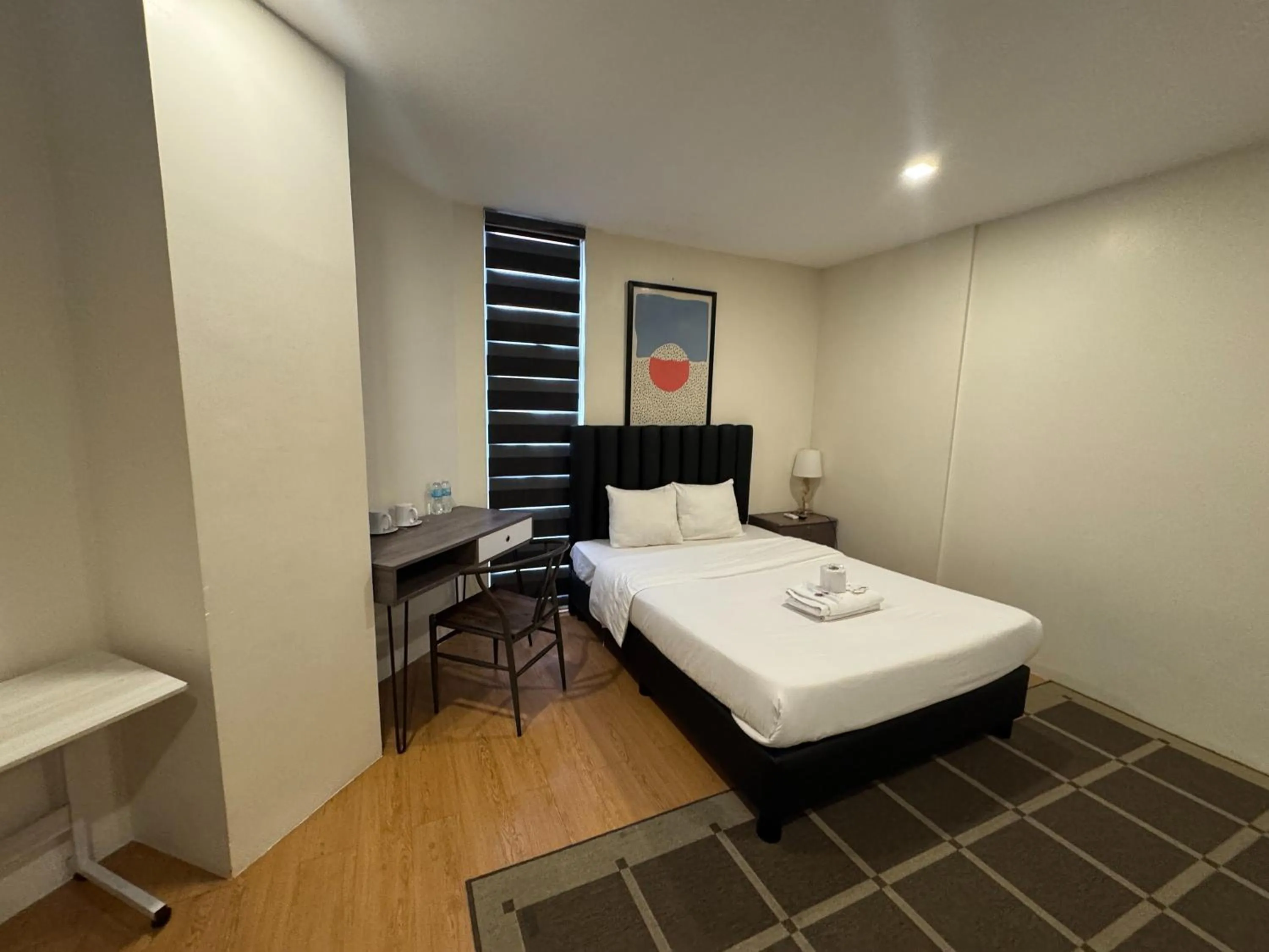 Bed in The Circuit Manor Hotel near Ayala Malls Circuit