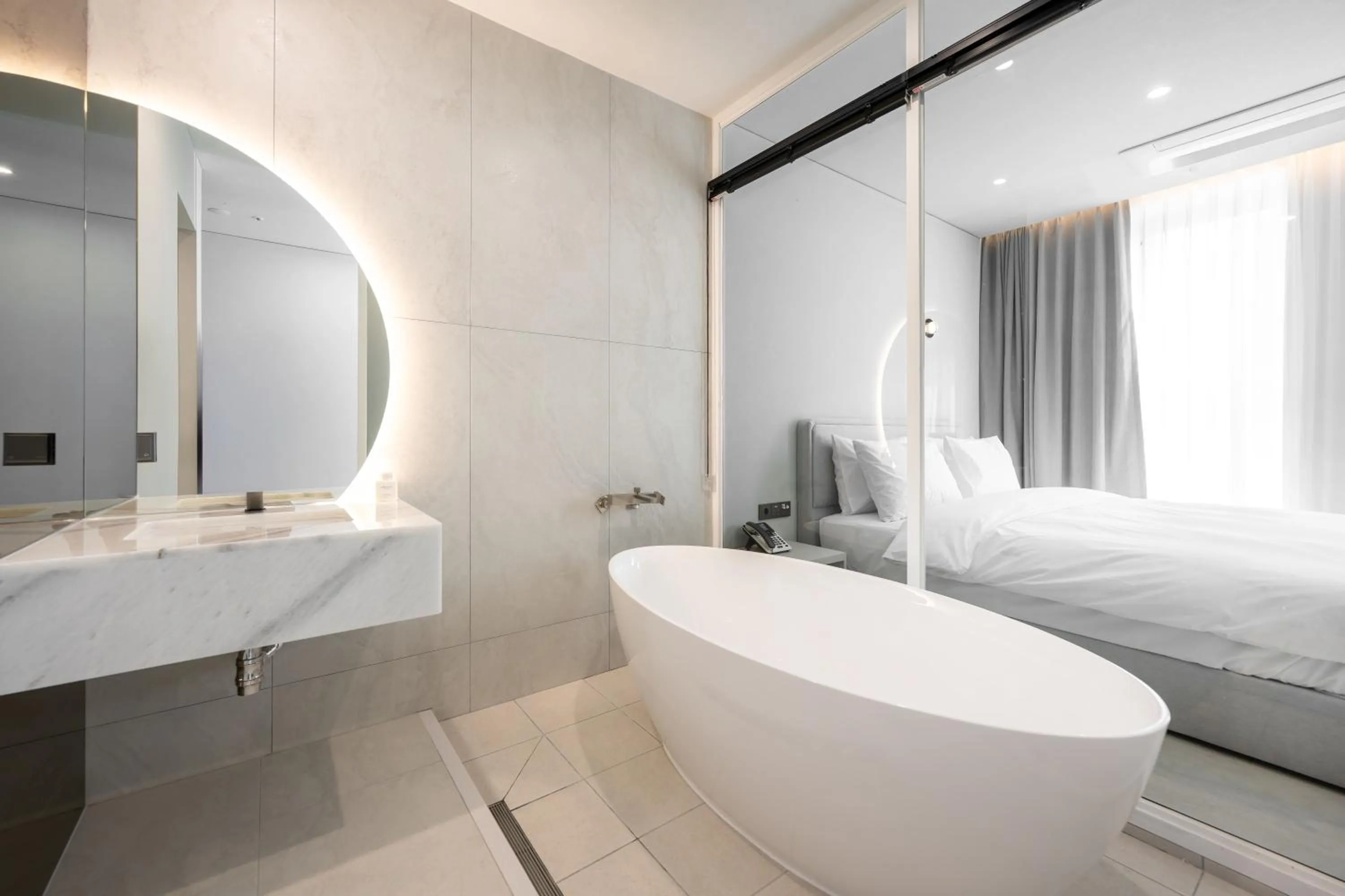 Bathroom, Bed in Gyeongju city hotel