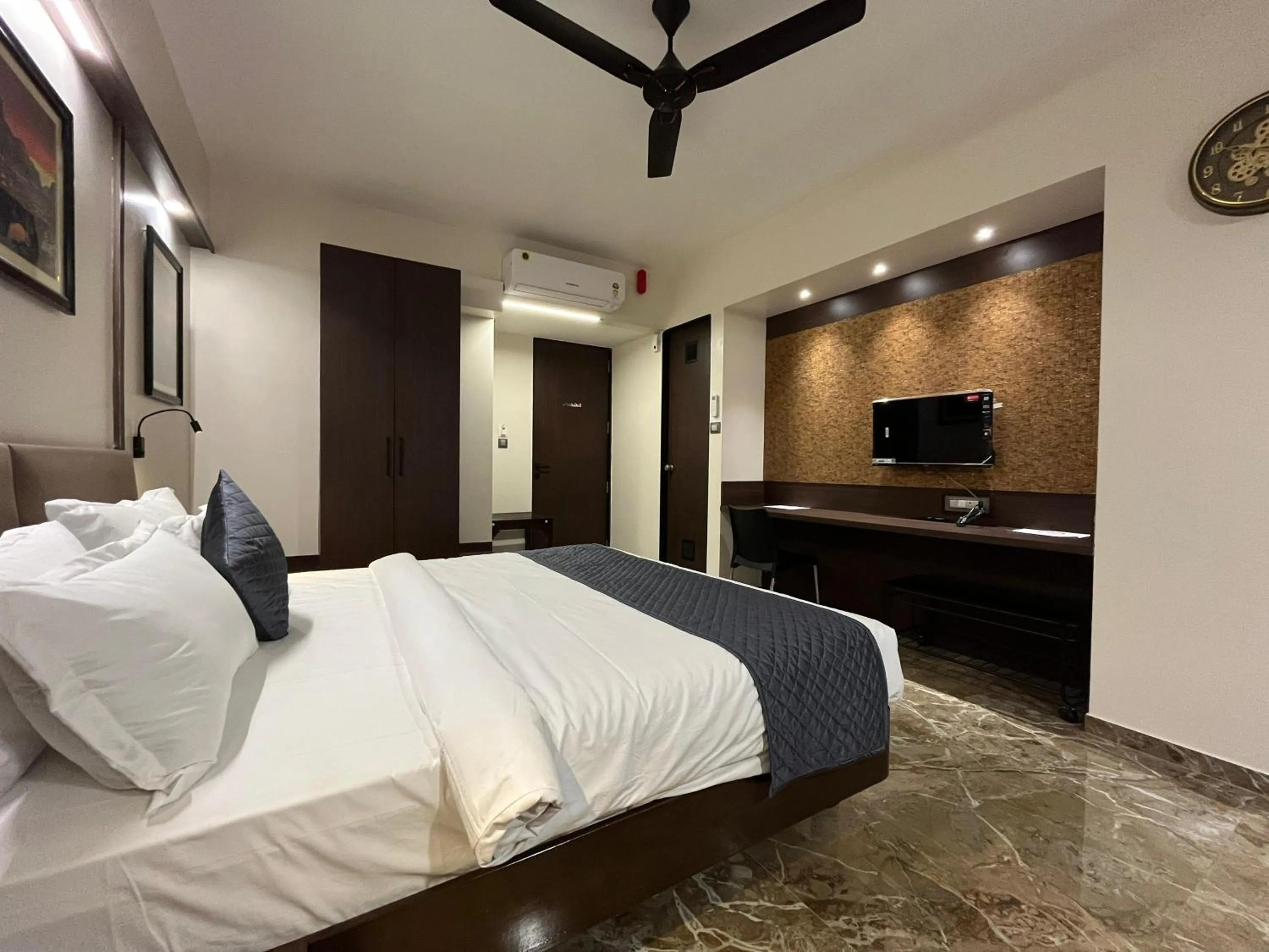 Bed in Kuber Suites