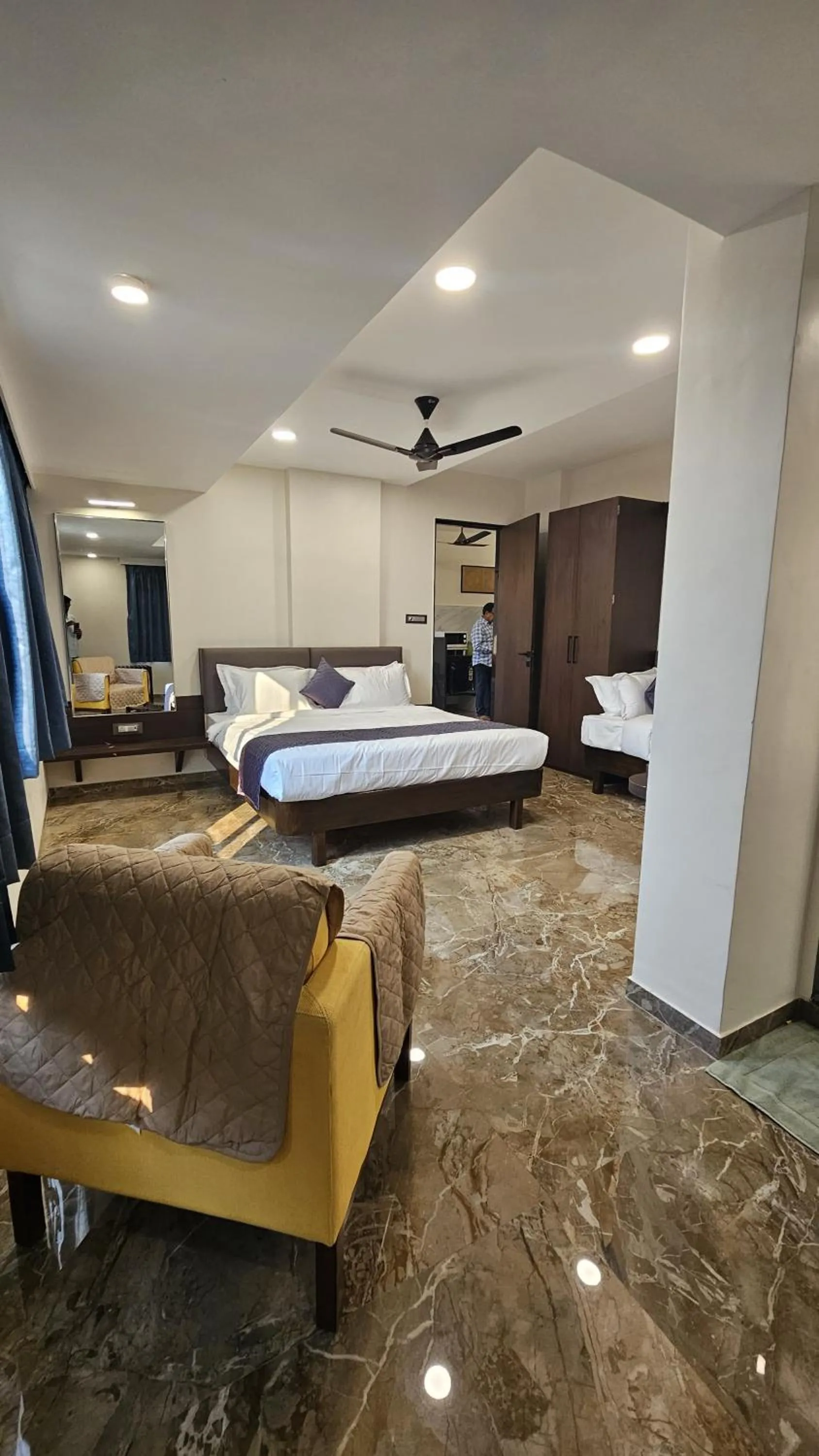 Bed in Kuber Suites