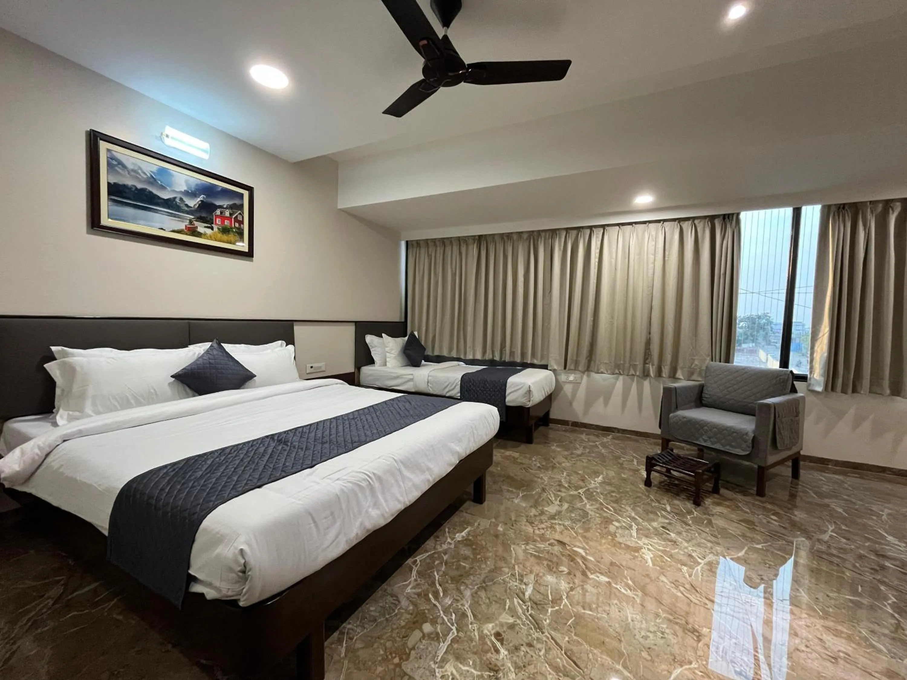 Bed in Kuber Suites