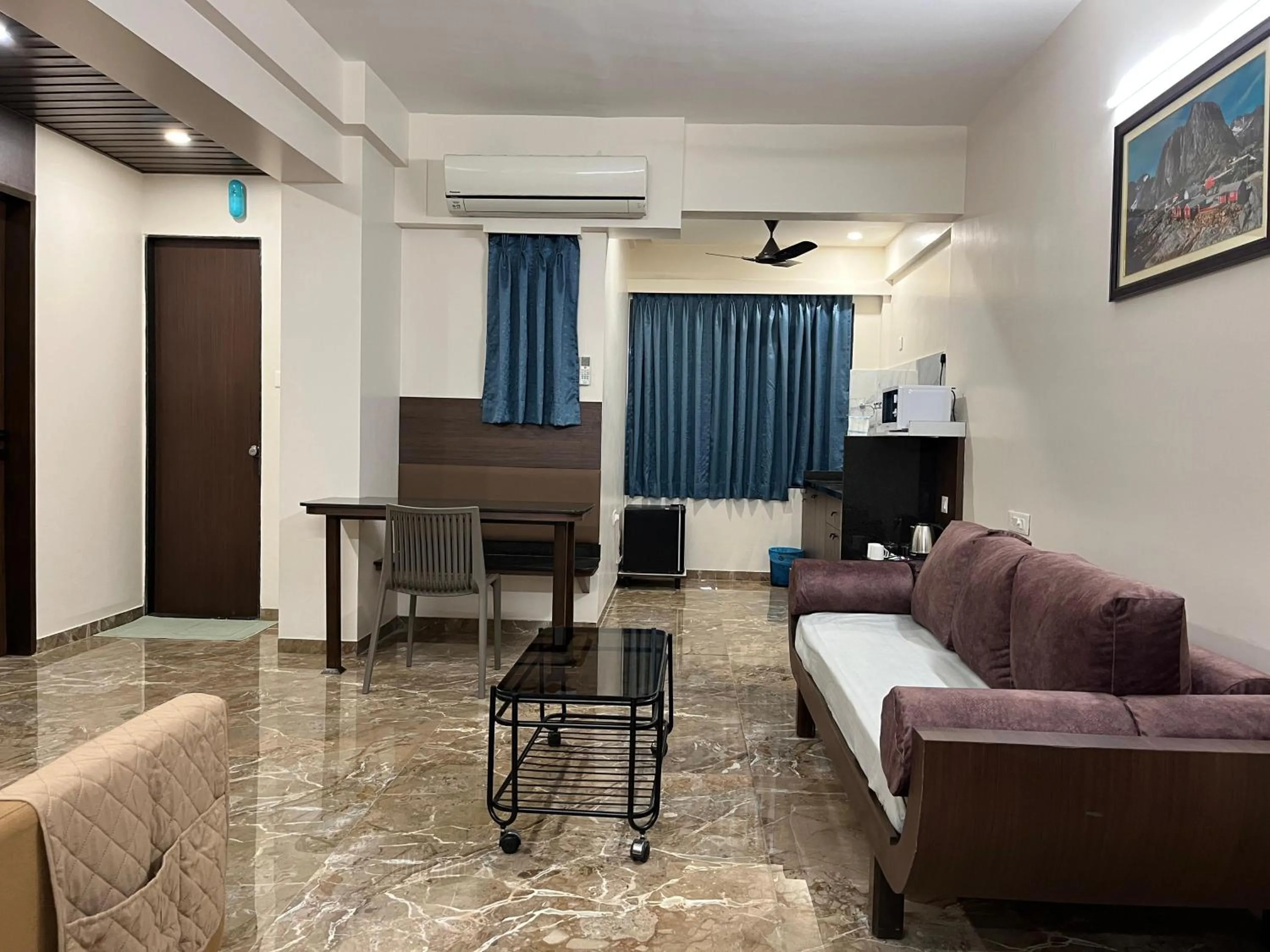Bed in Kuber Suites