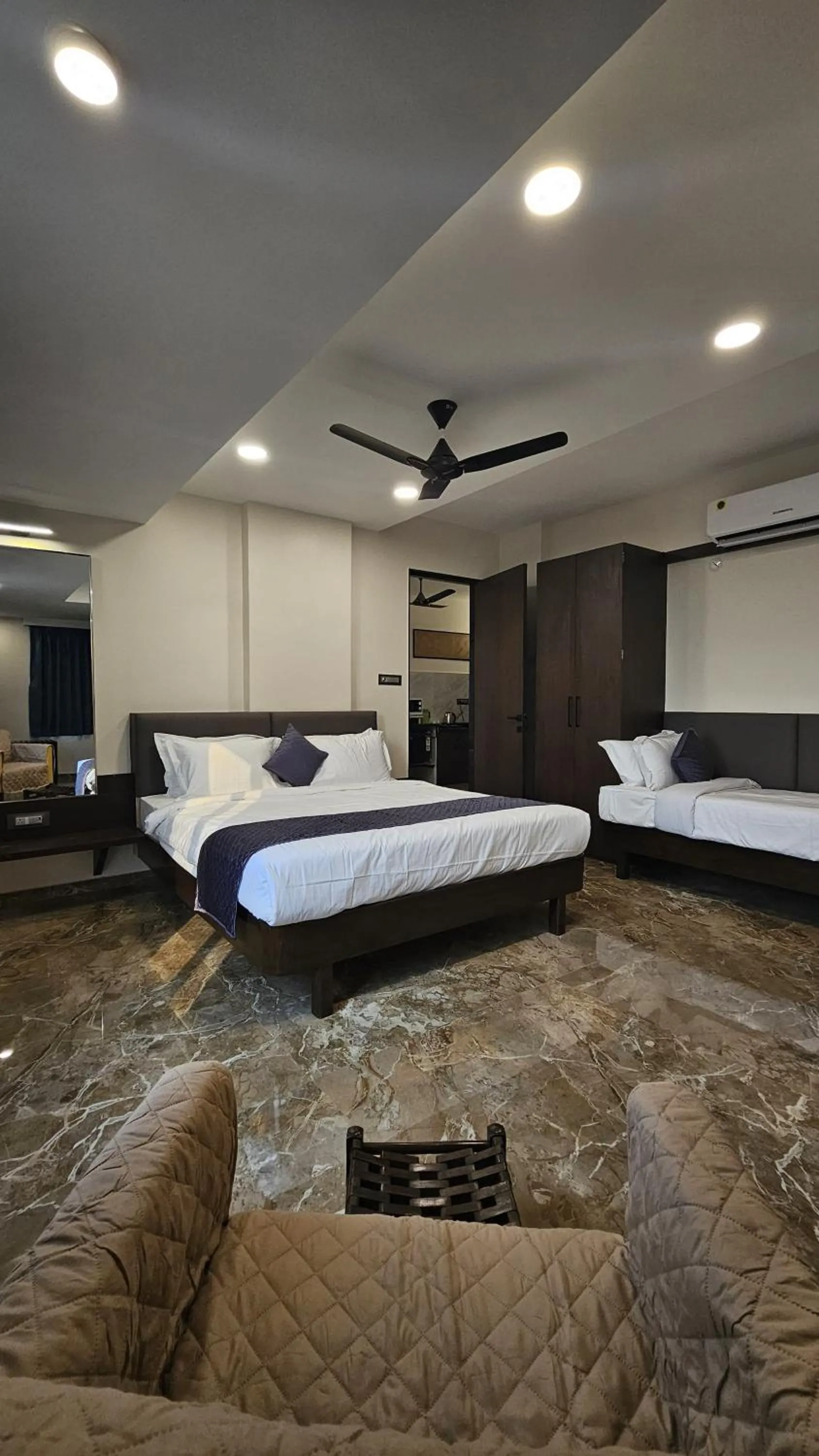 Bed in Kuber Suites