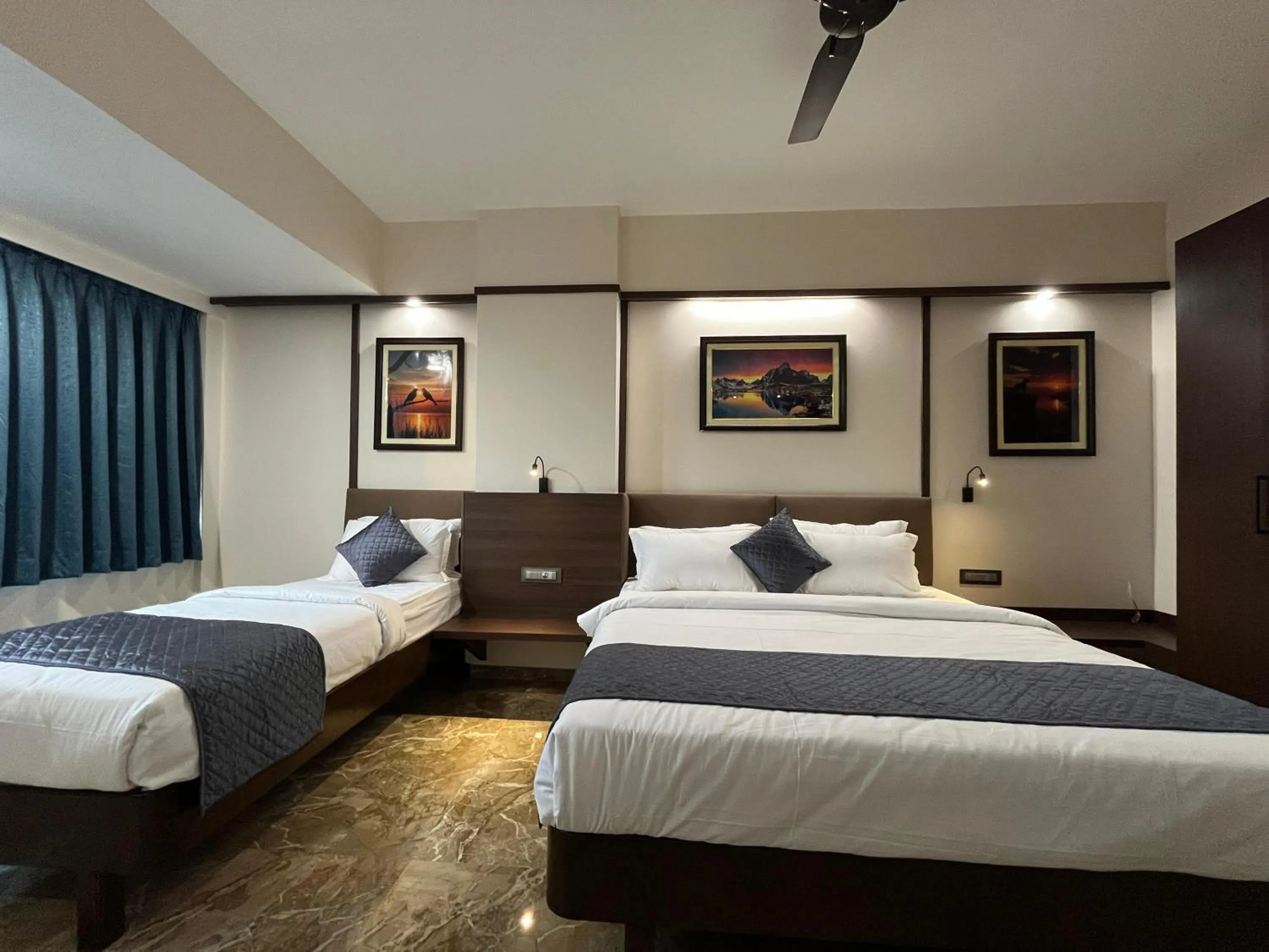 Bed in Kuber Suites