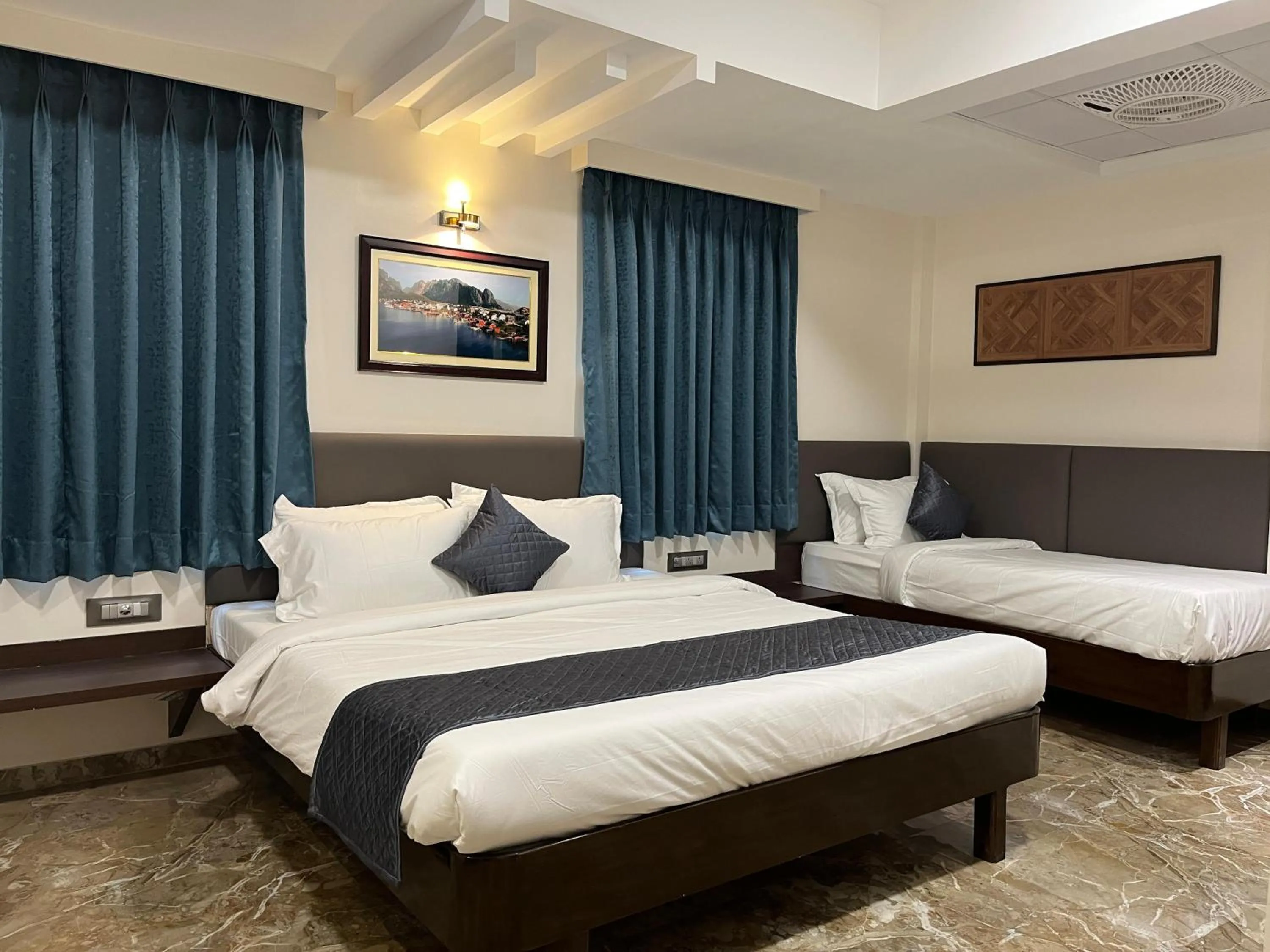Bed in Kuber Suites