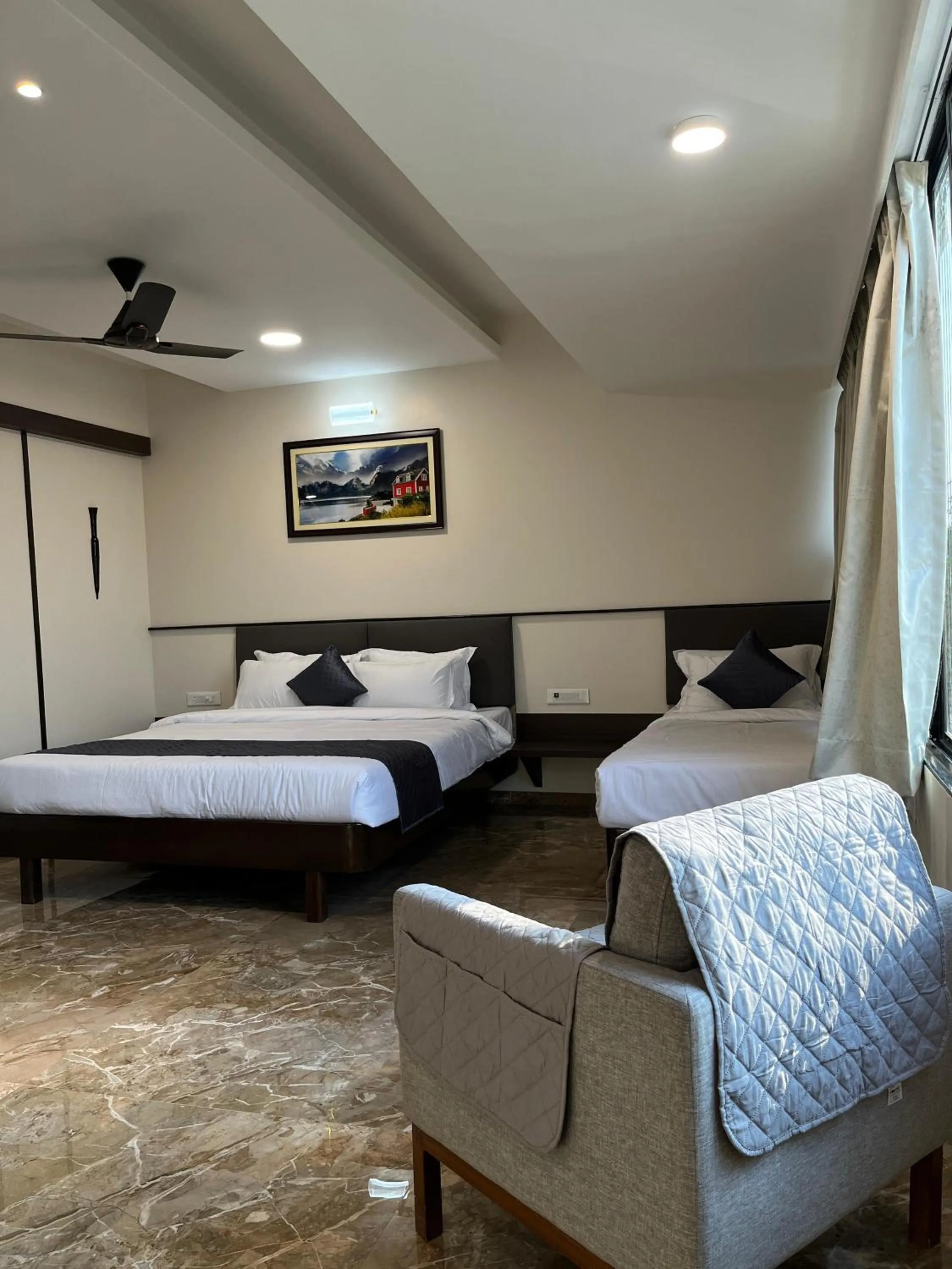 Bed in Kuber Suites