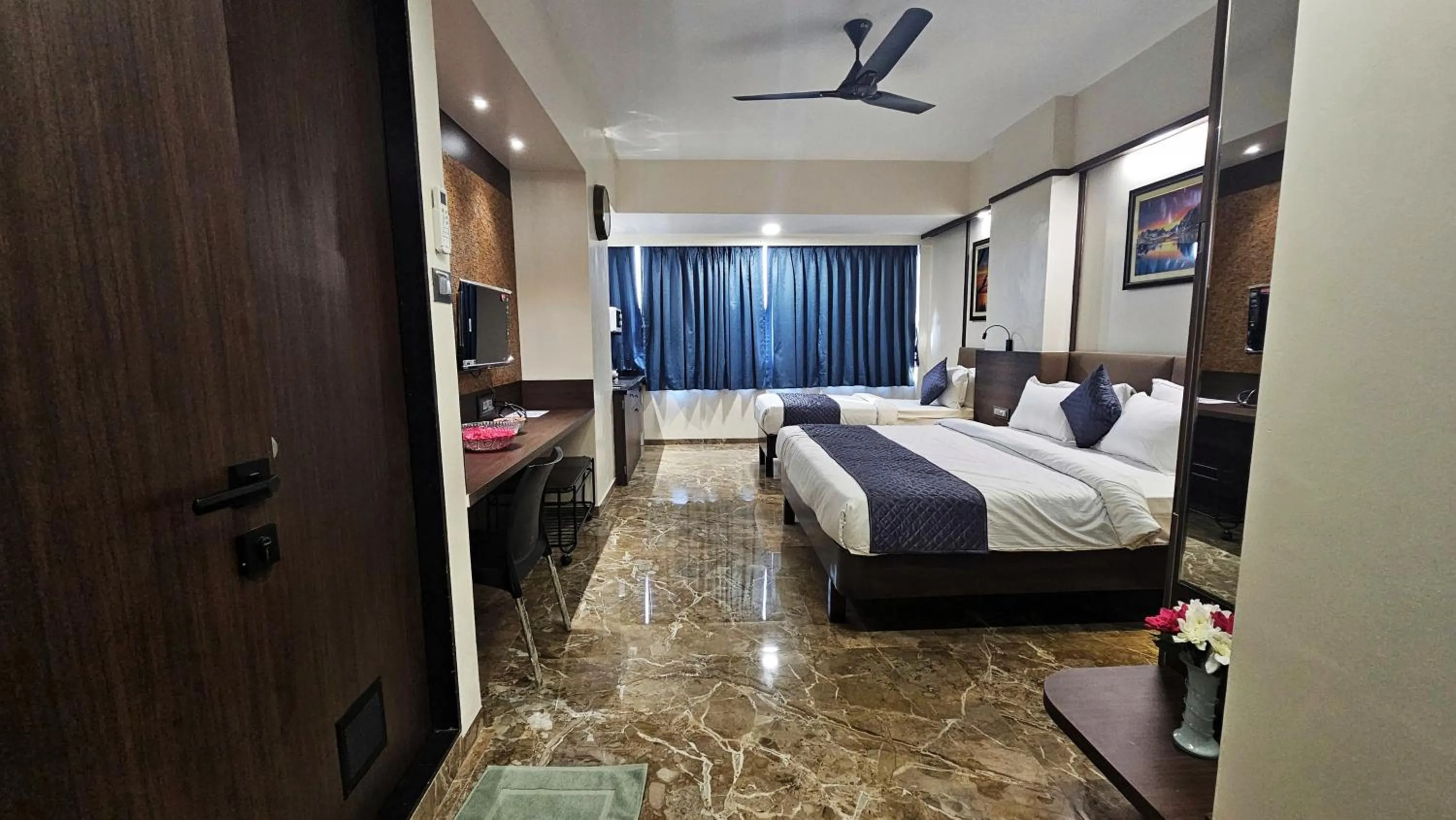 Bed in Kuber Suites