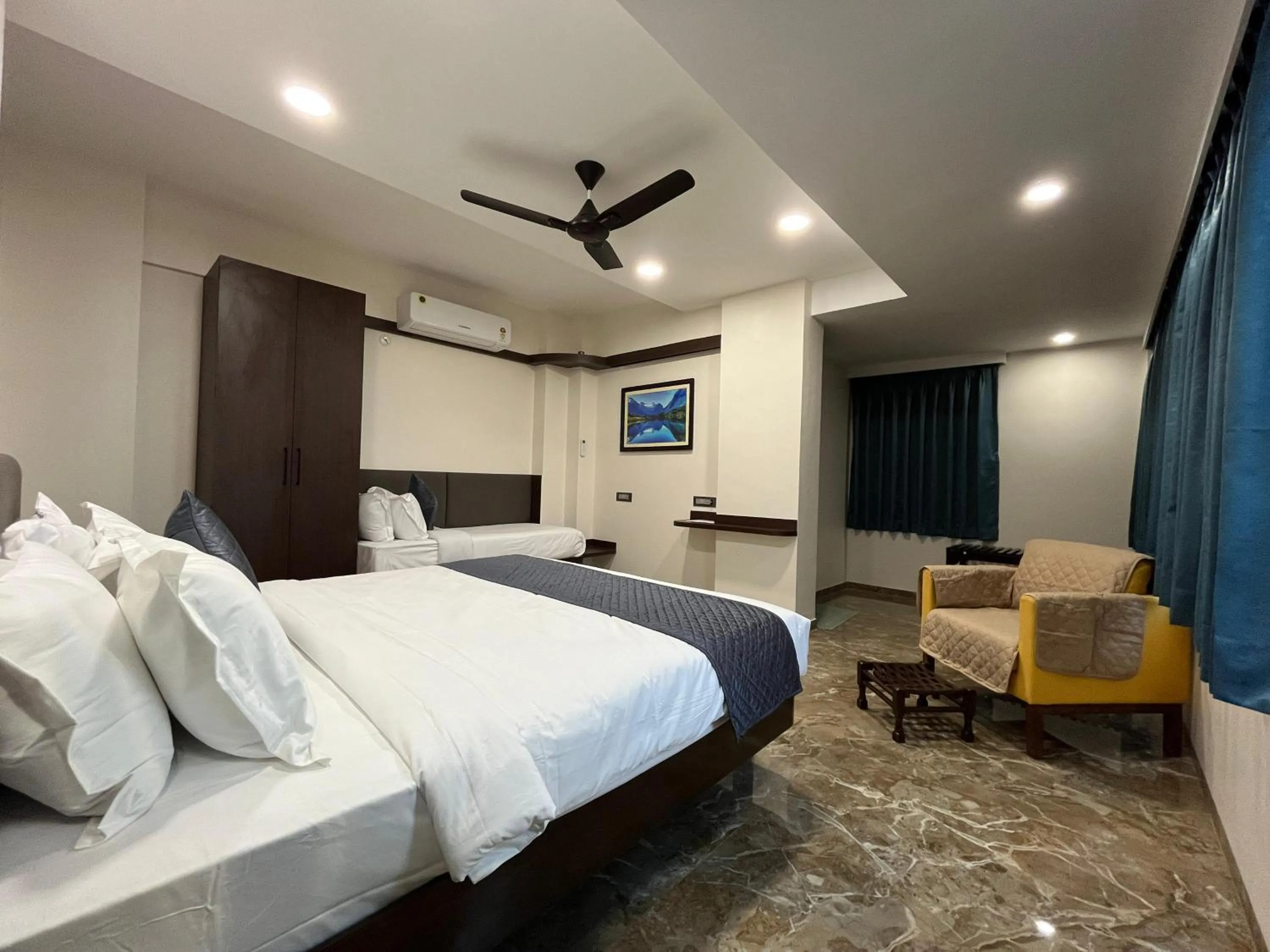 Bed in Kuber Suites