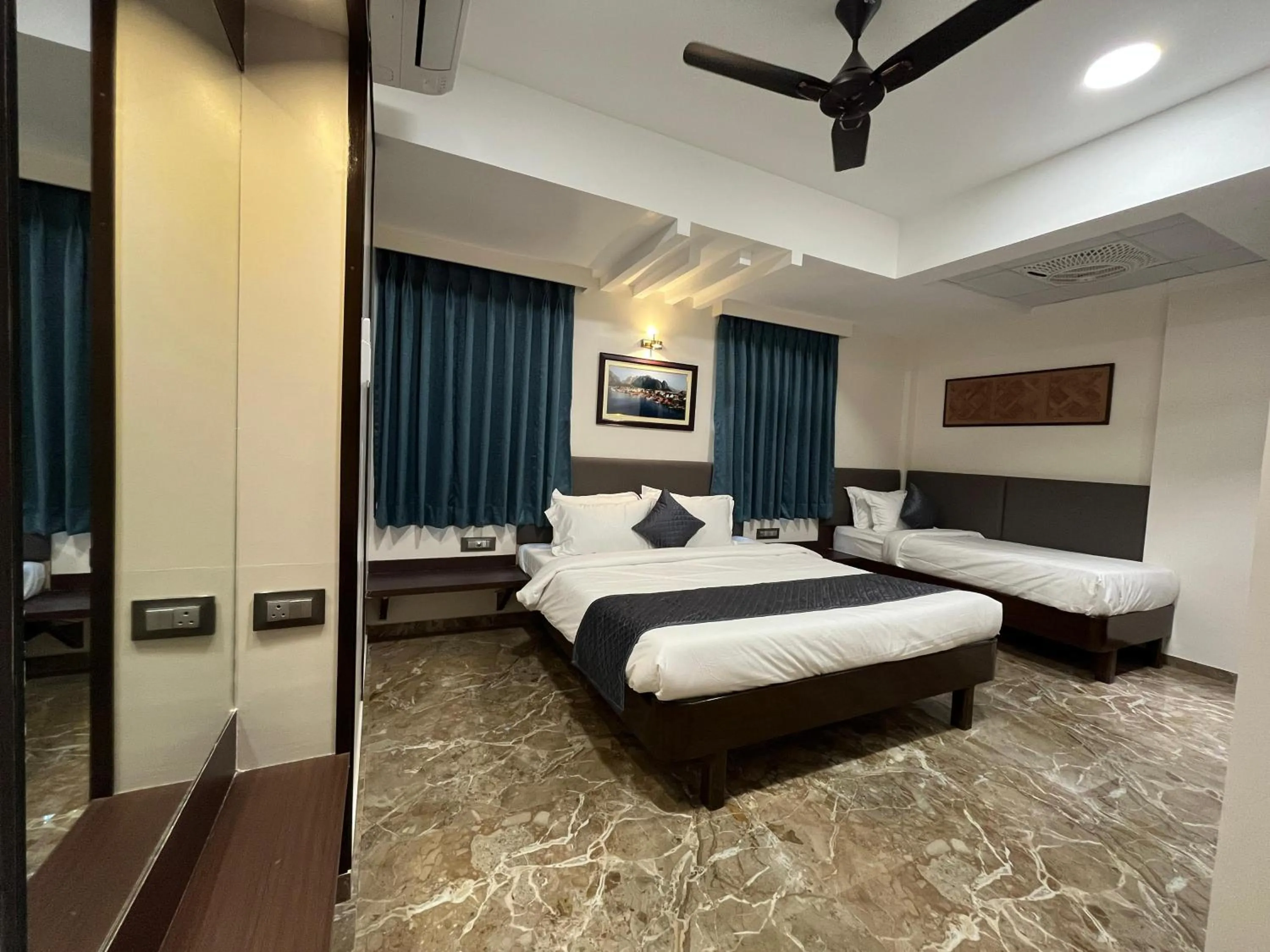 Bed in Kuber Suites