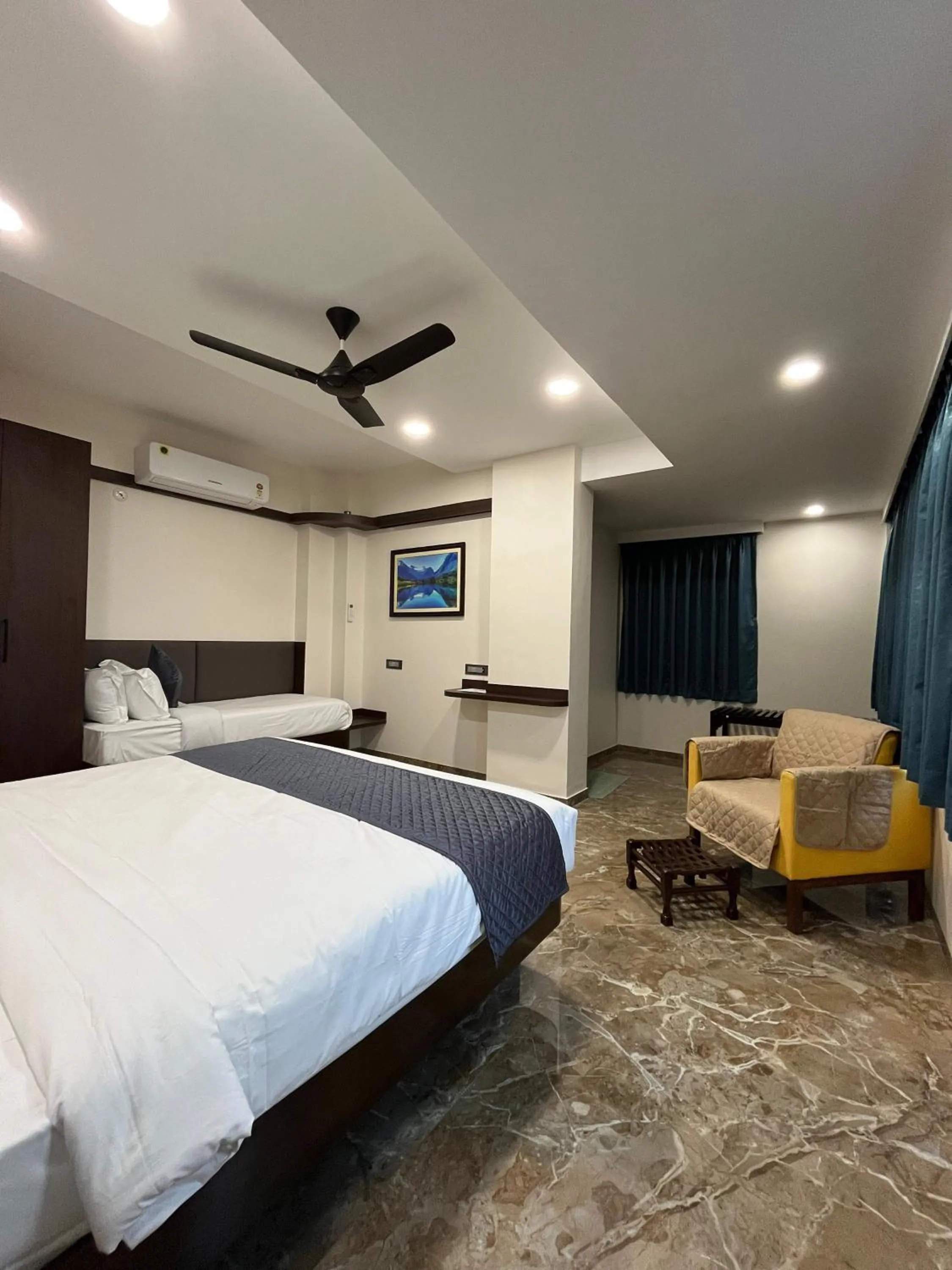 Bed in Kuber Suites