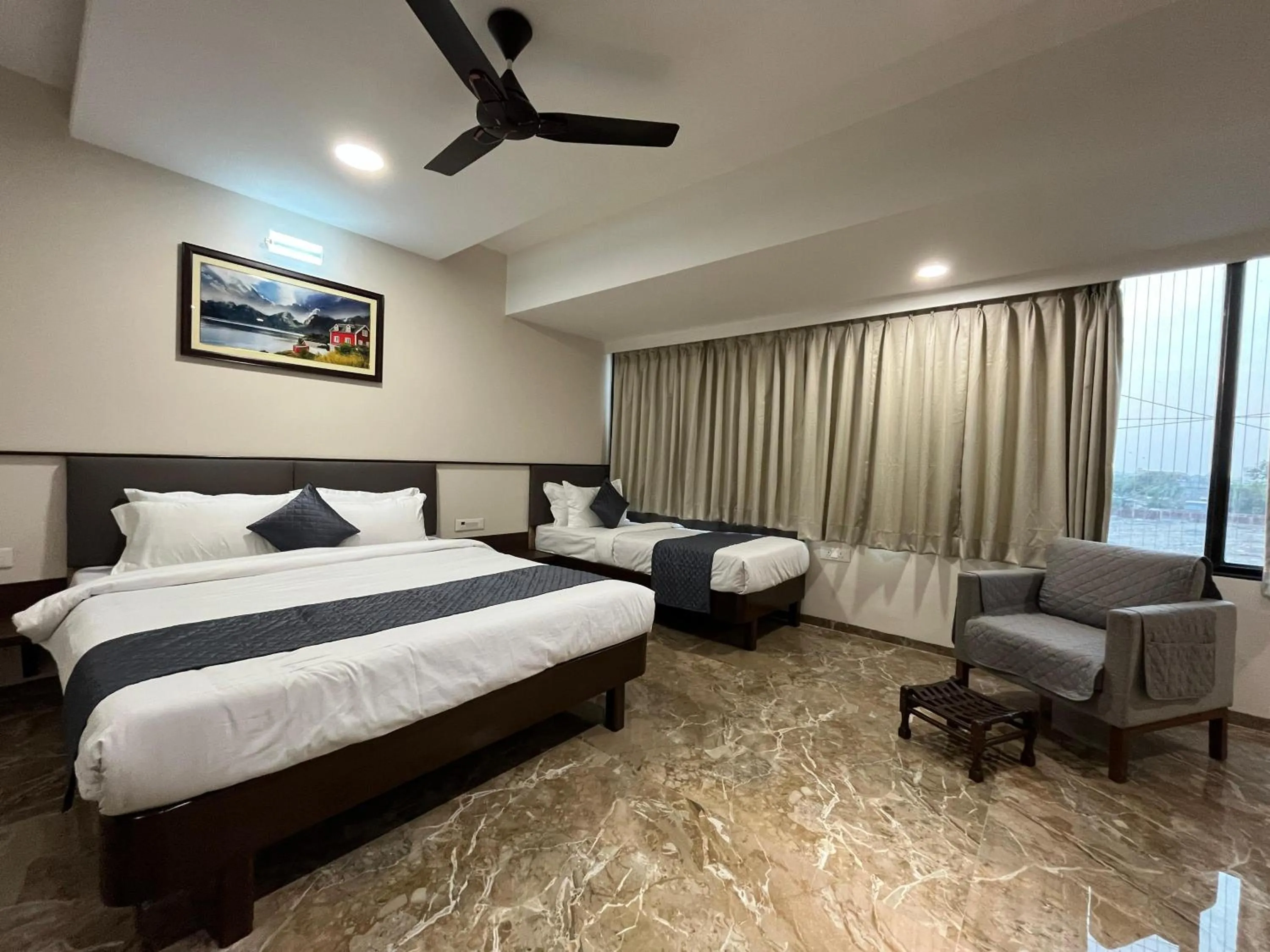 Bed in Kuber Suites