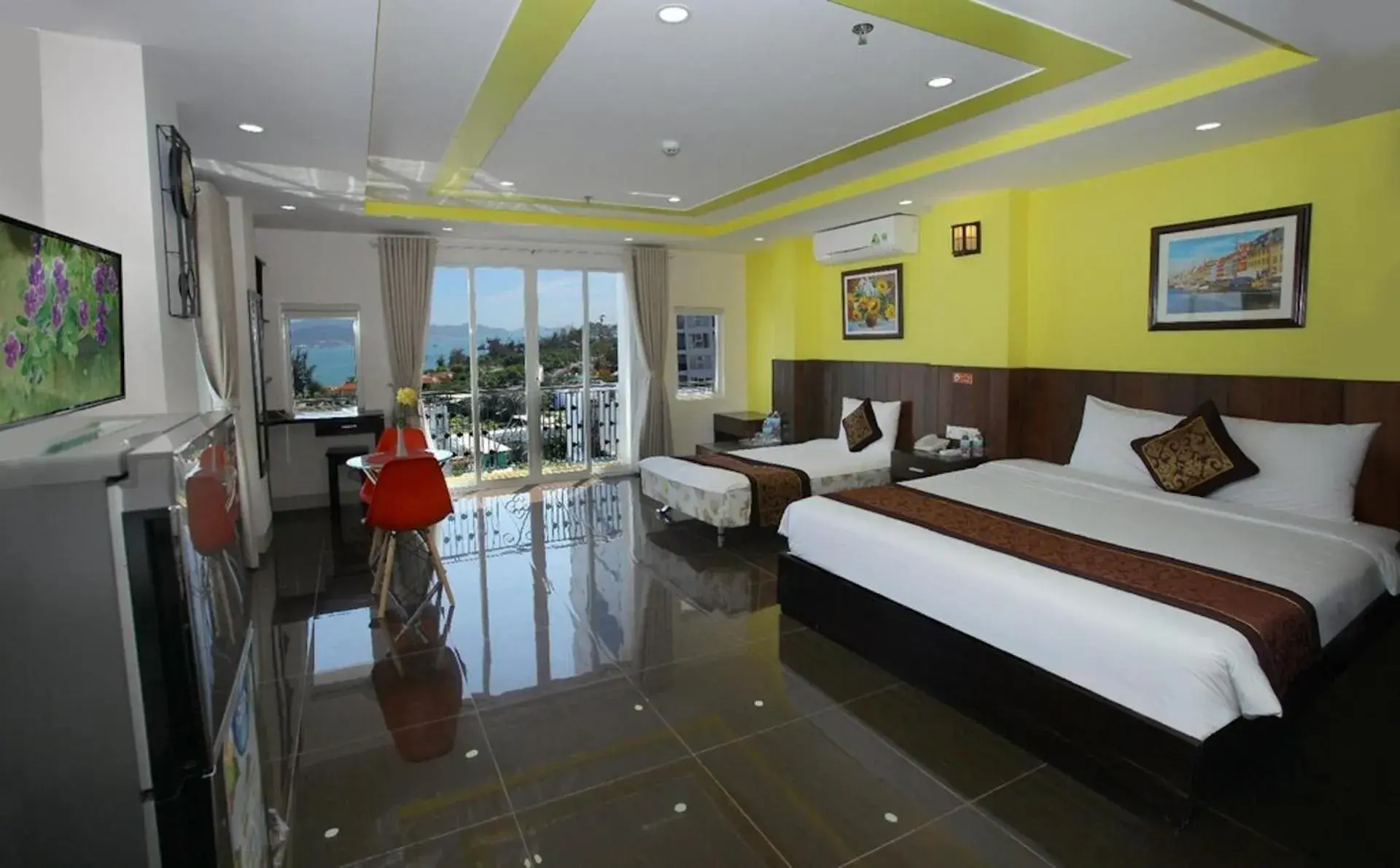 Deluxe Triple Room with Sea View in Melyna Hotel Nha Trang Beach Deluxe Triple Room with Sea View in Melyna Hotel Nha Trang Beach
