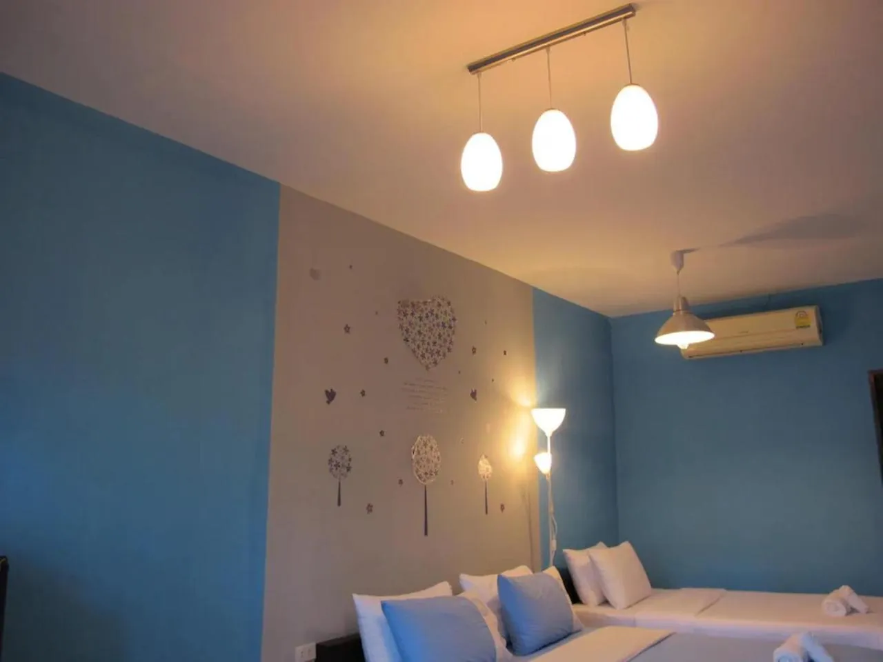 Bed in Panviman Amphawa Garden Resort