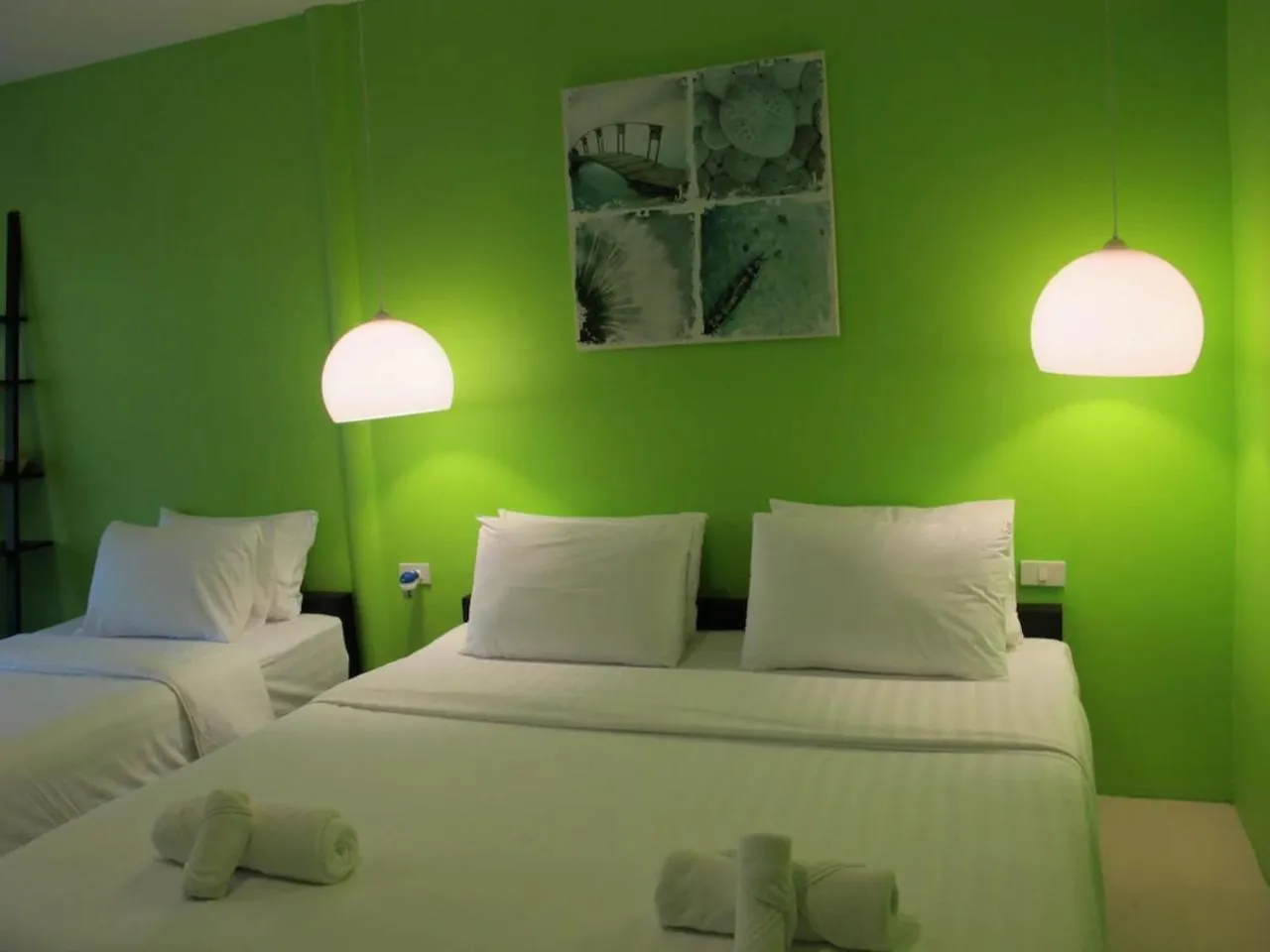 Bed in Panviman Amphawa Garden Resort