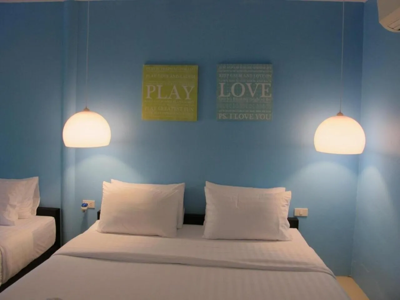 Bed in Panviman Amphawa Garden Resort