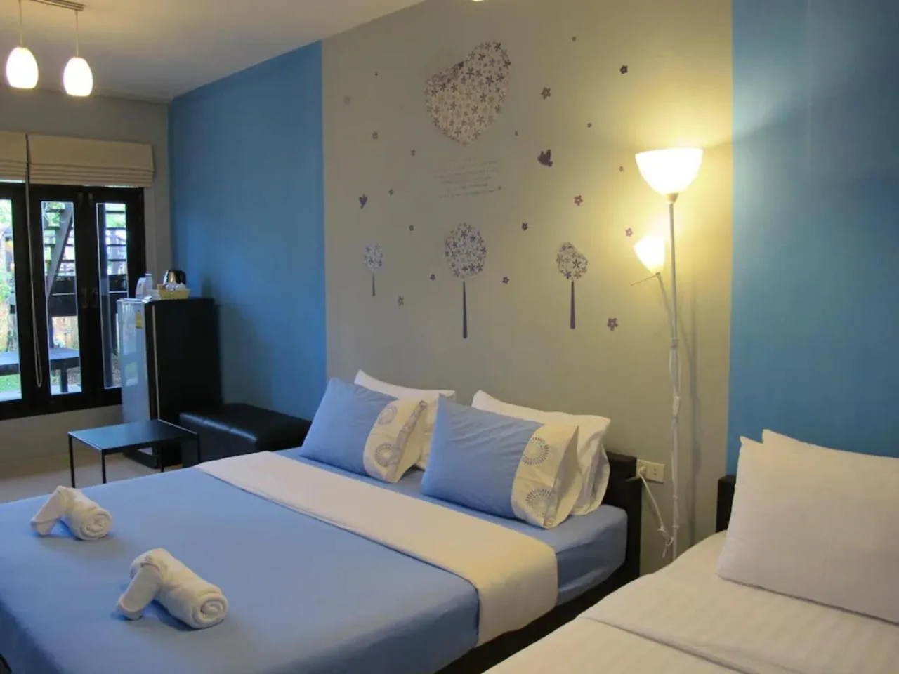 Bed in Panviman Amphawa Garden Resort