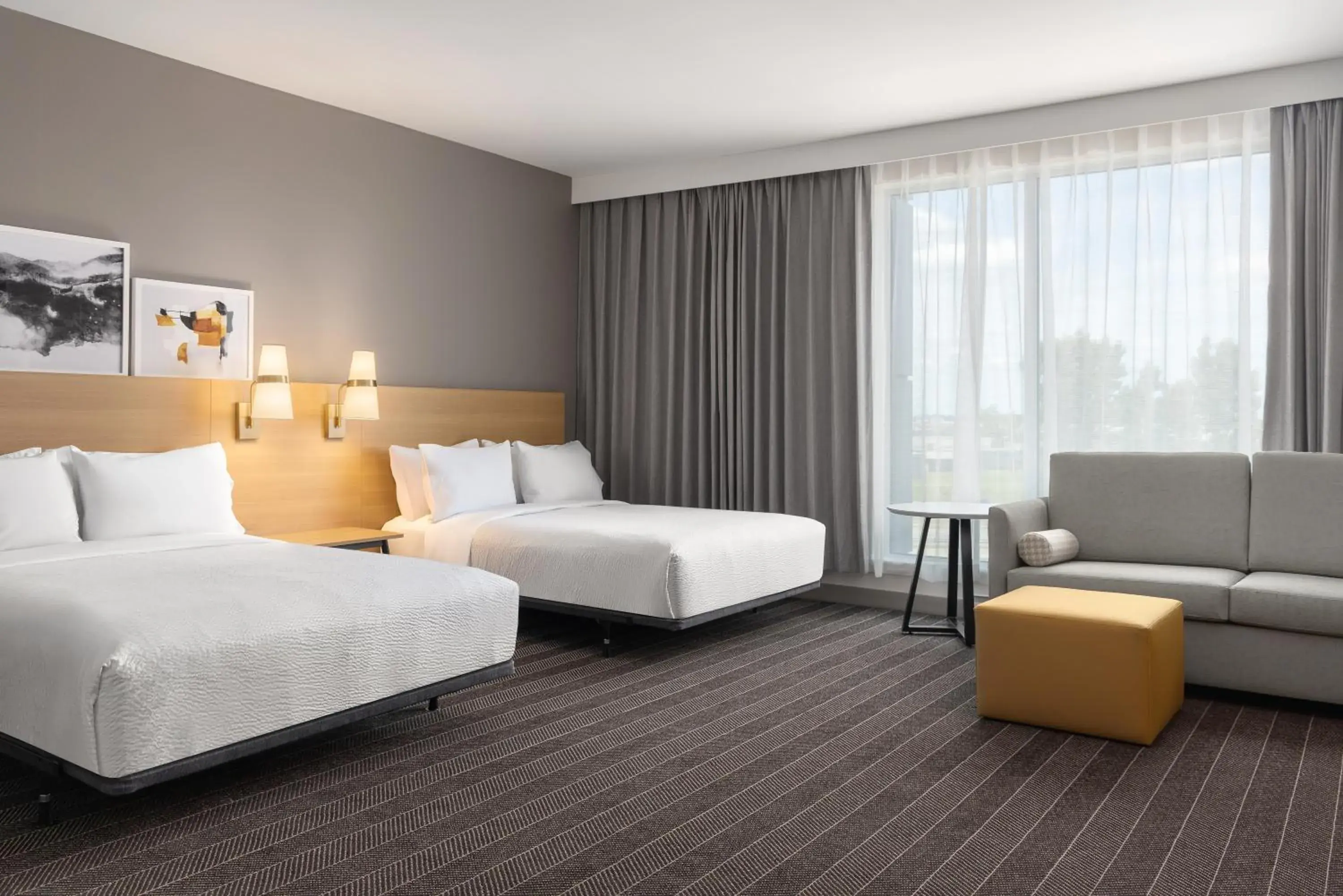 Photo of the whole room, Bed in Staybridge Suites Montreal Airport - St-Laurent by IHG Photo of the whole room, Bed in Staybridge Suites Montreal Airport - St-Laurent by IHG