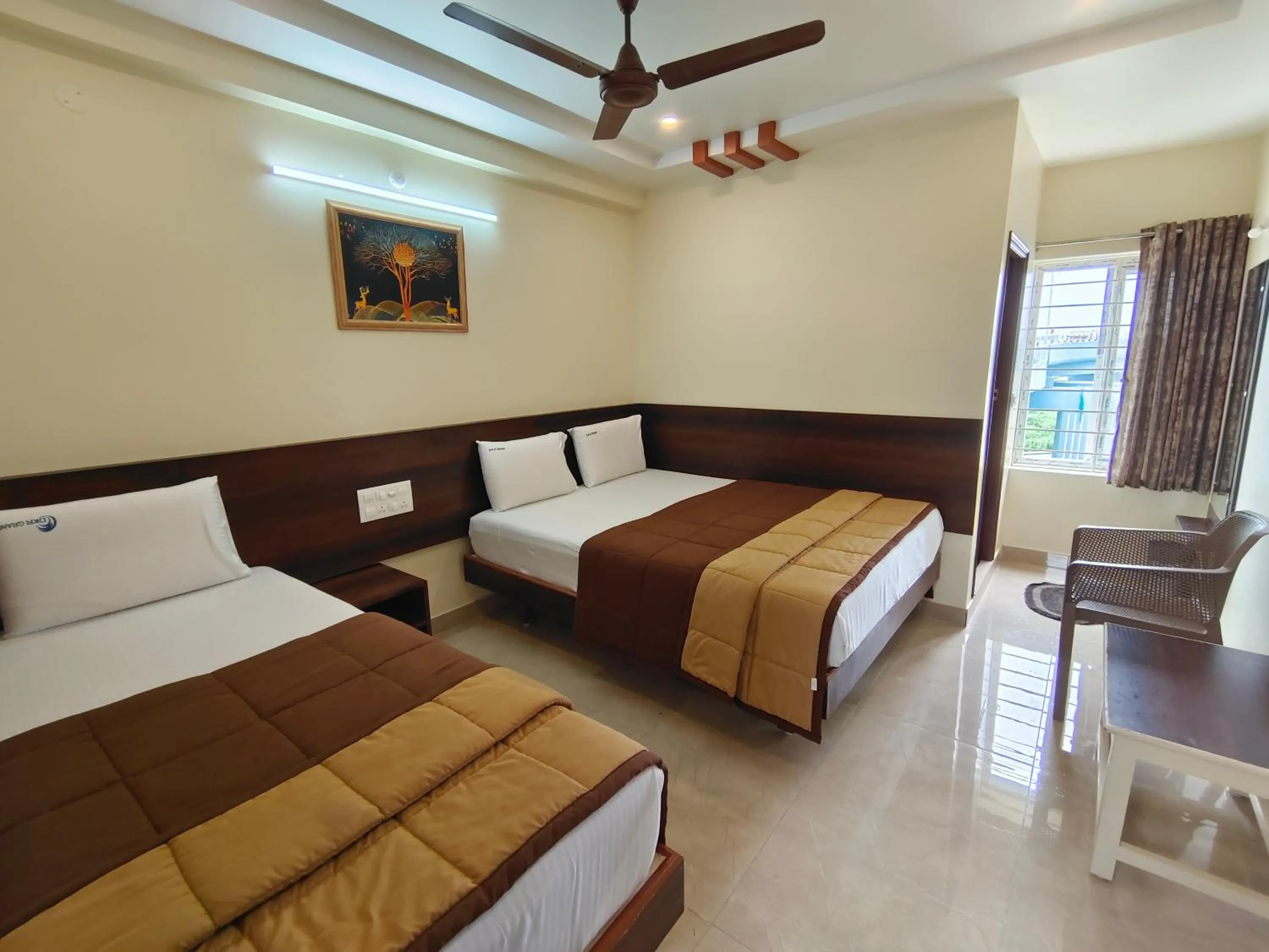 Bed in Hotel DKR Grand