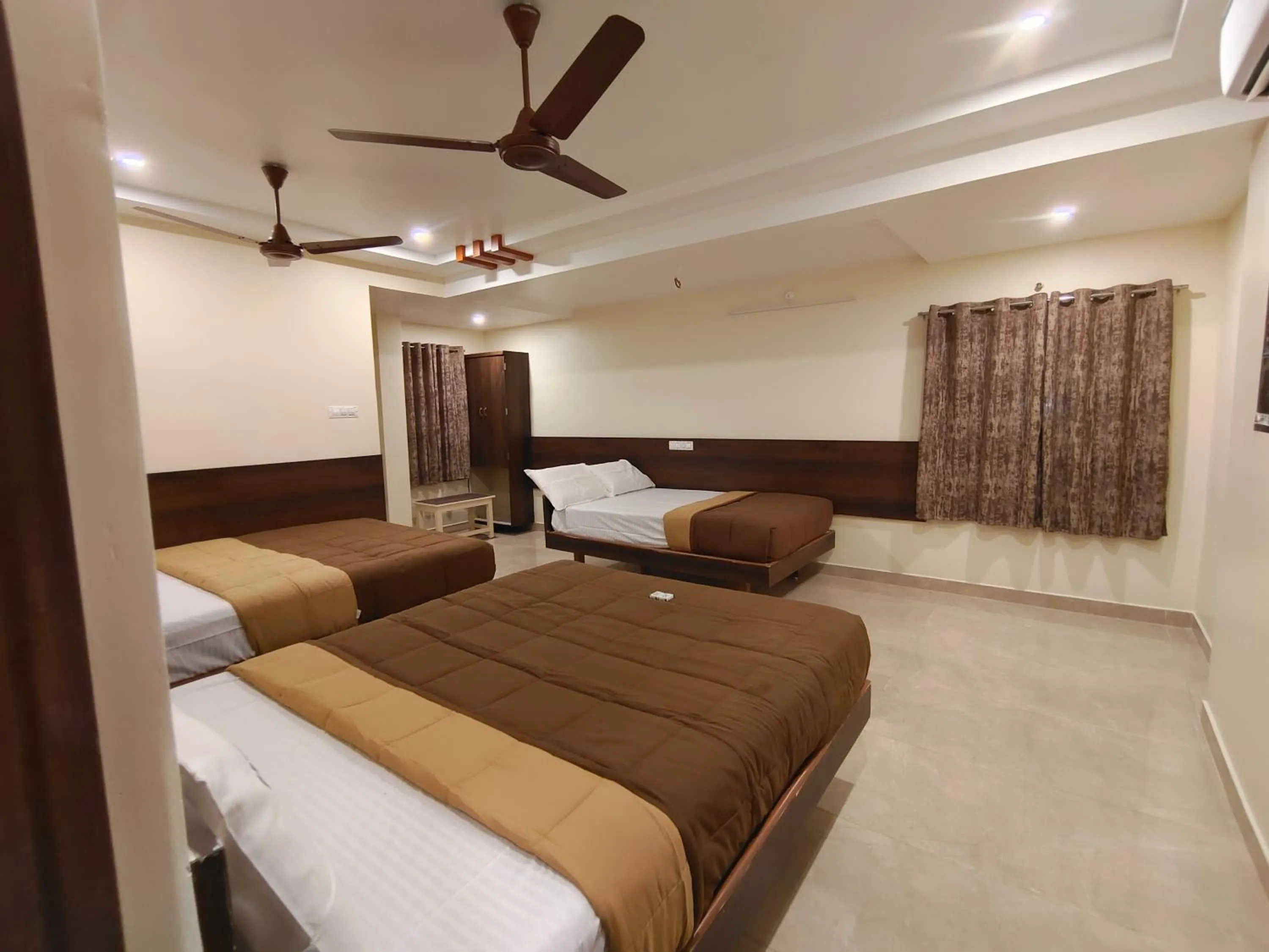 Bed in Hotel DKR Grand