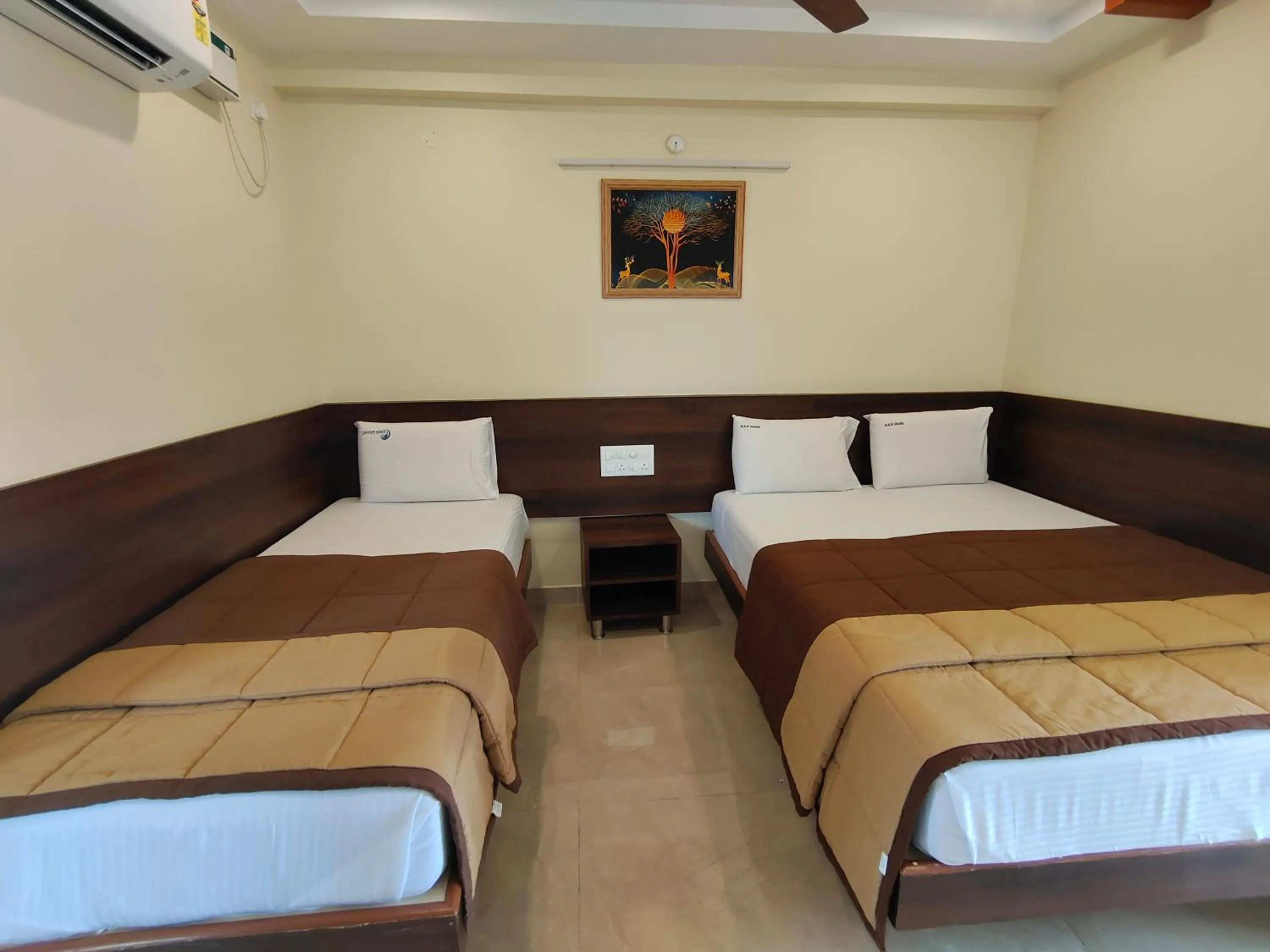 Bed in Hotel DKR Grand