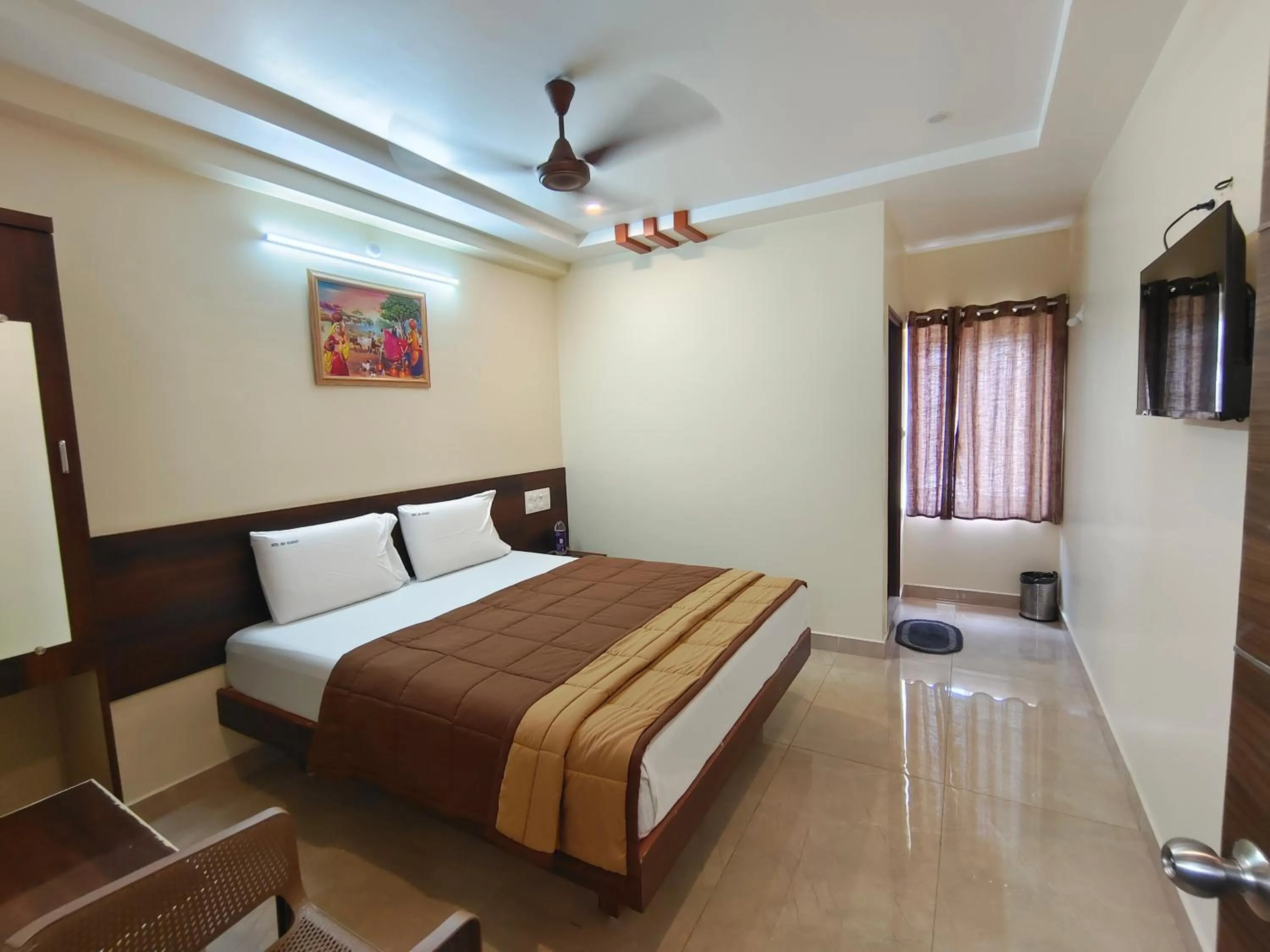 Bed in Hotel DKR Grand