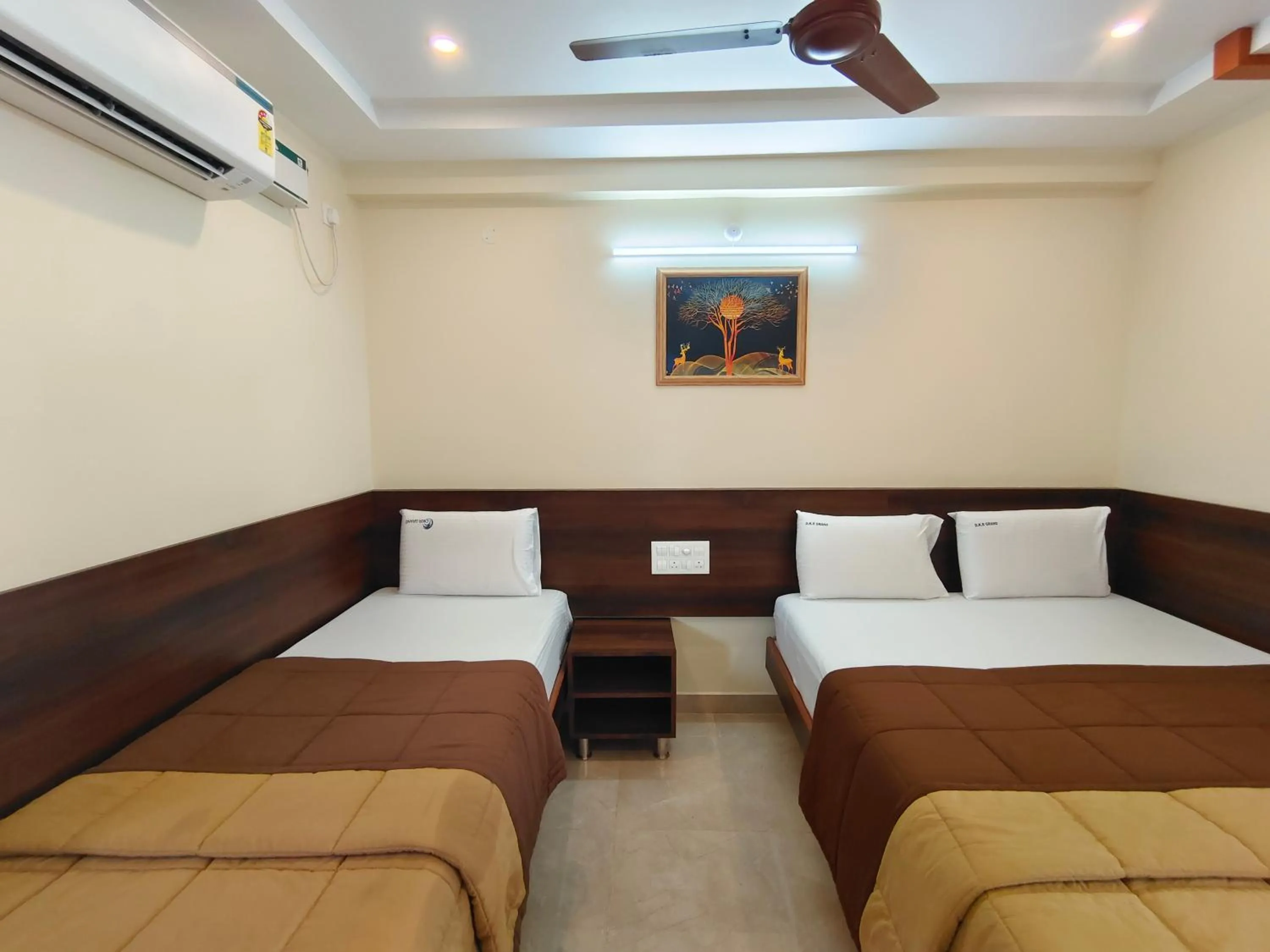 Bed in Hotel DKR Grand