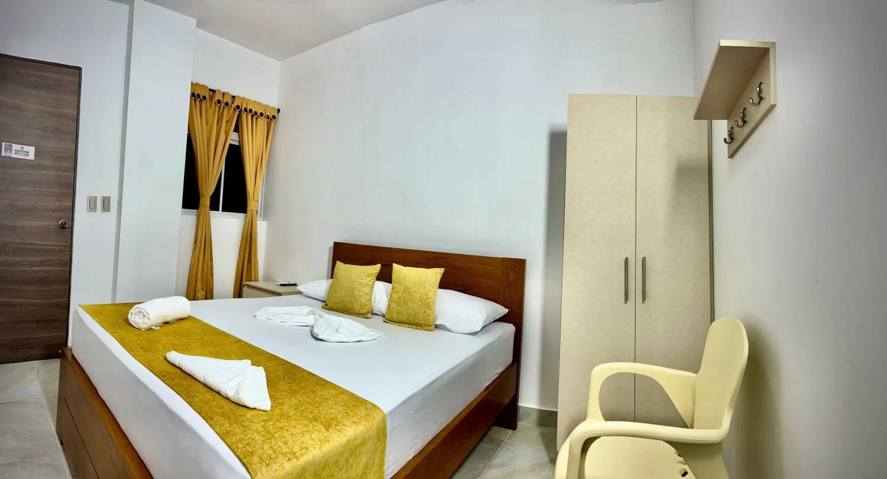 Photo of the whole room, Bed in Hotel Roma Urabá