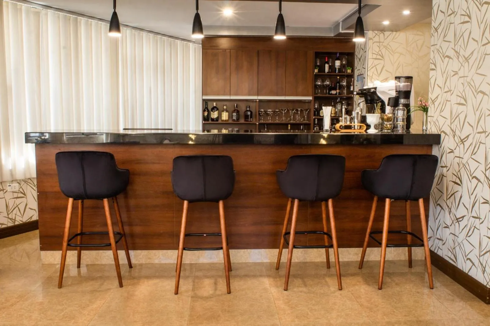 Lounge or bar in ROLES Hotel