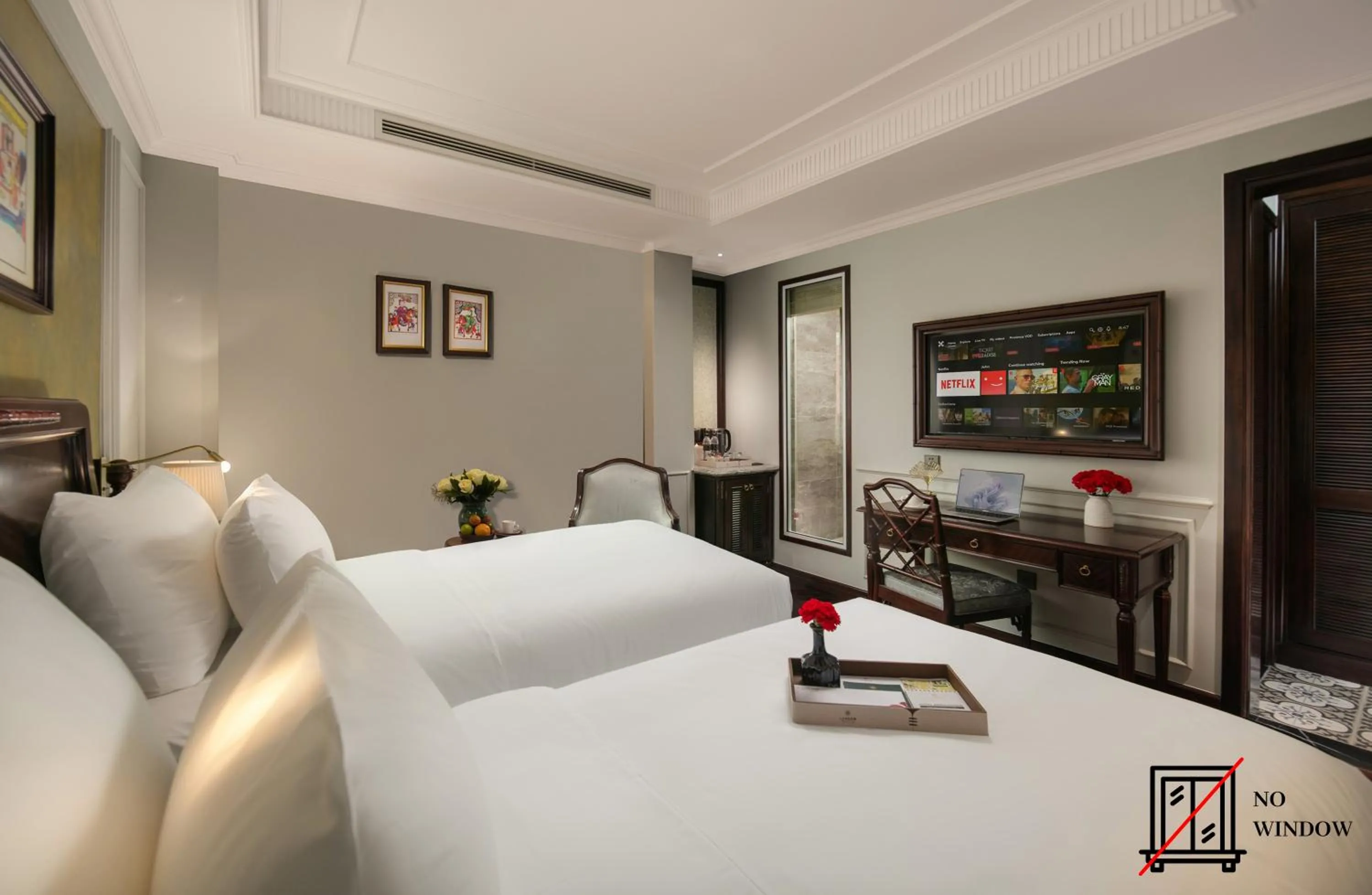 Bed in La Mejor Indochine Hotel