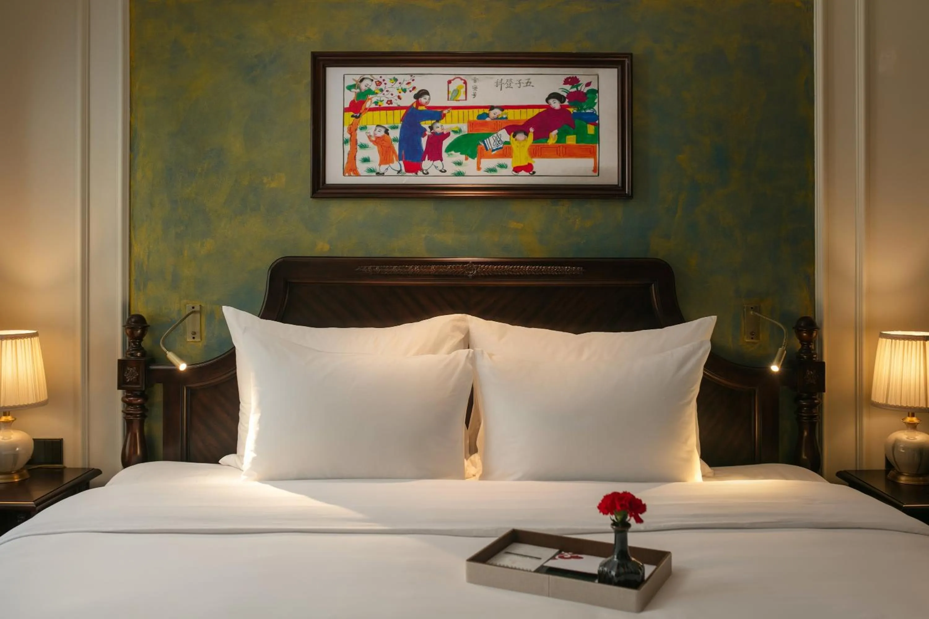 Bed in La Mejor Indochine Hotel