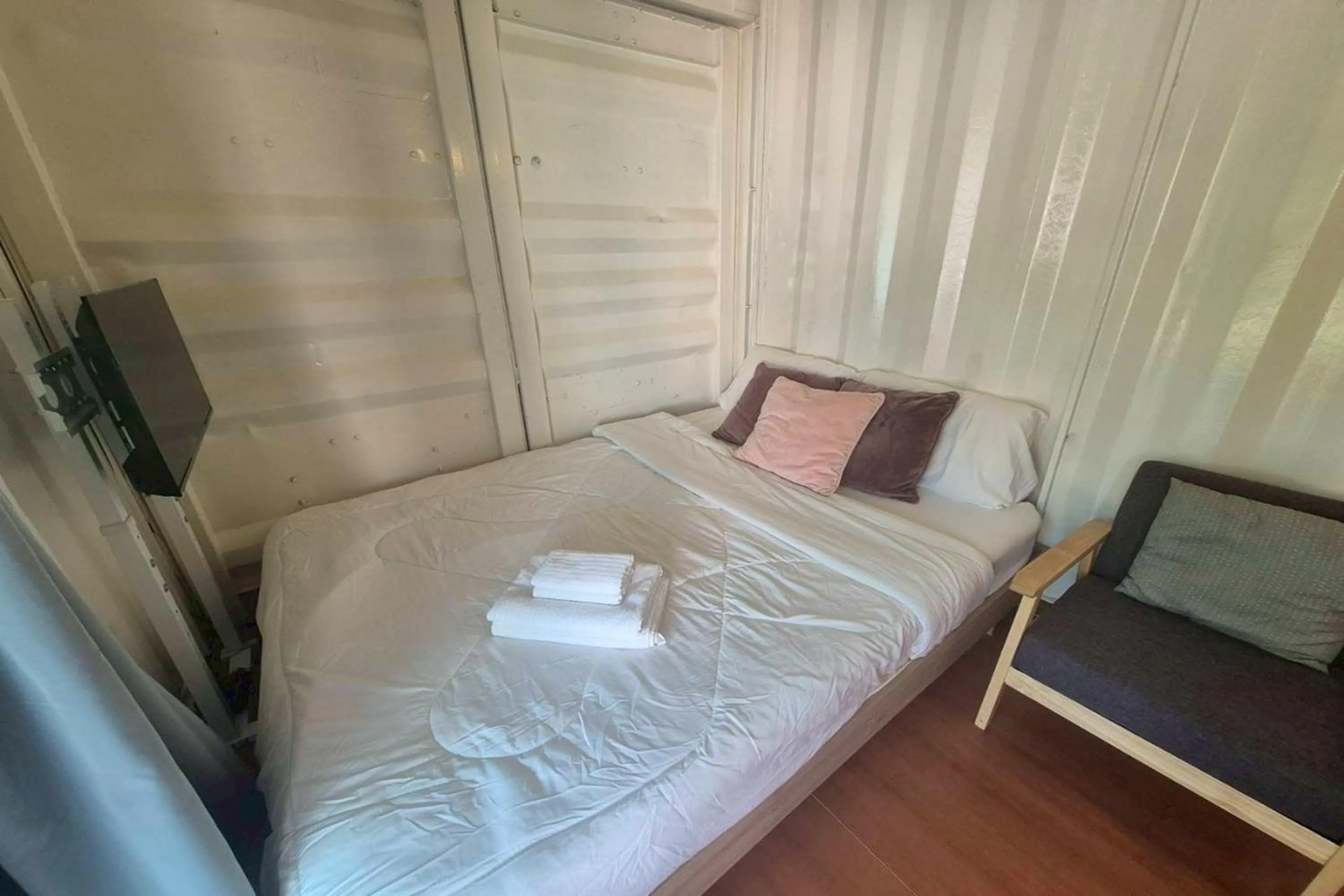 Bed in NaNine Glamping