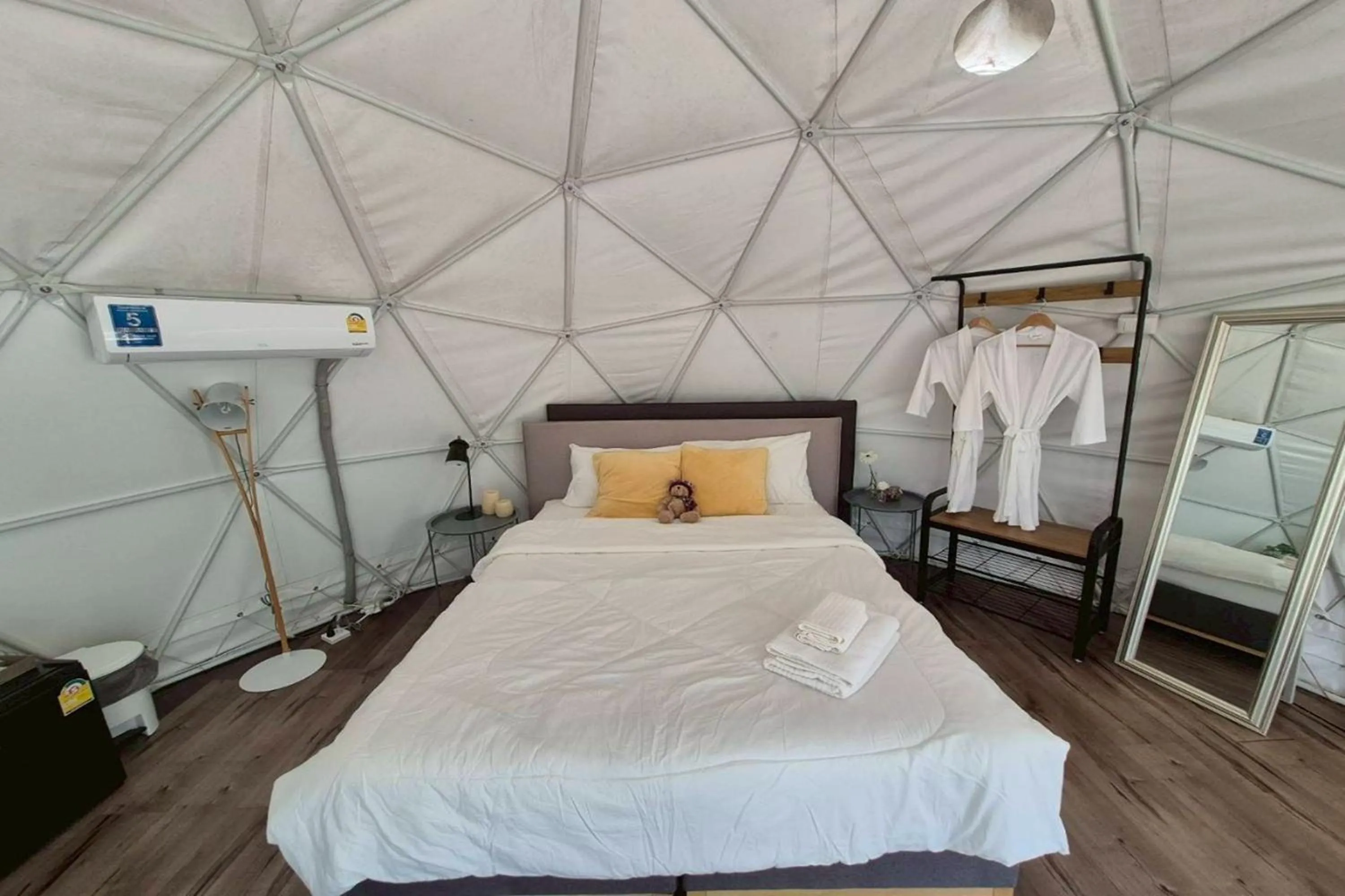 Bed in NaNine Glamping