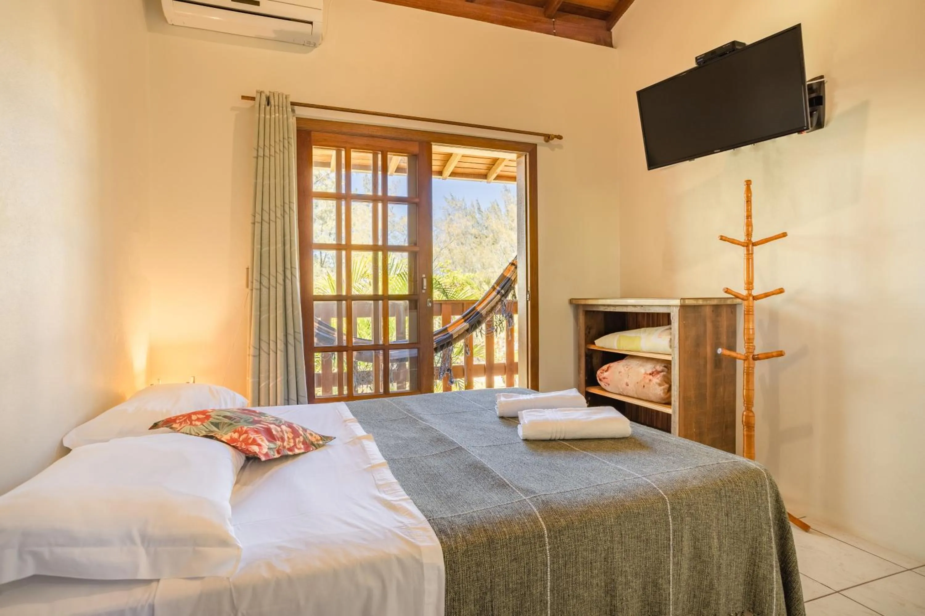 Bed in Pousada do Paraiso