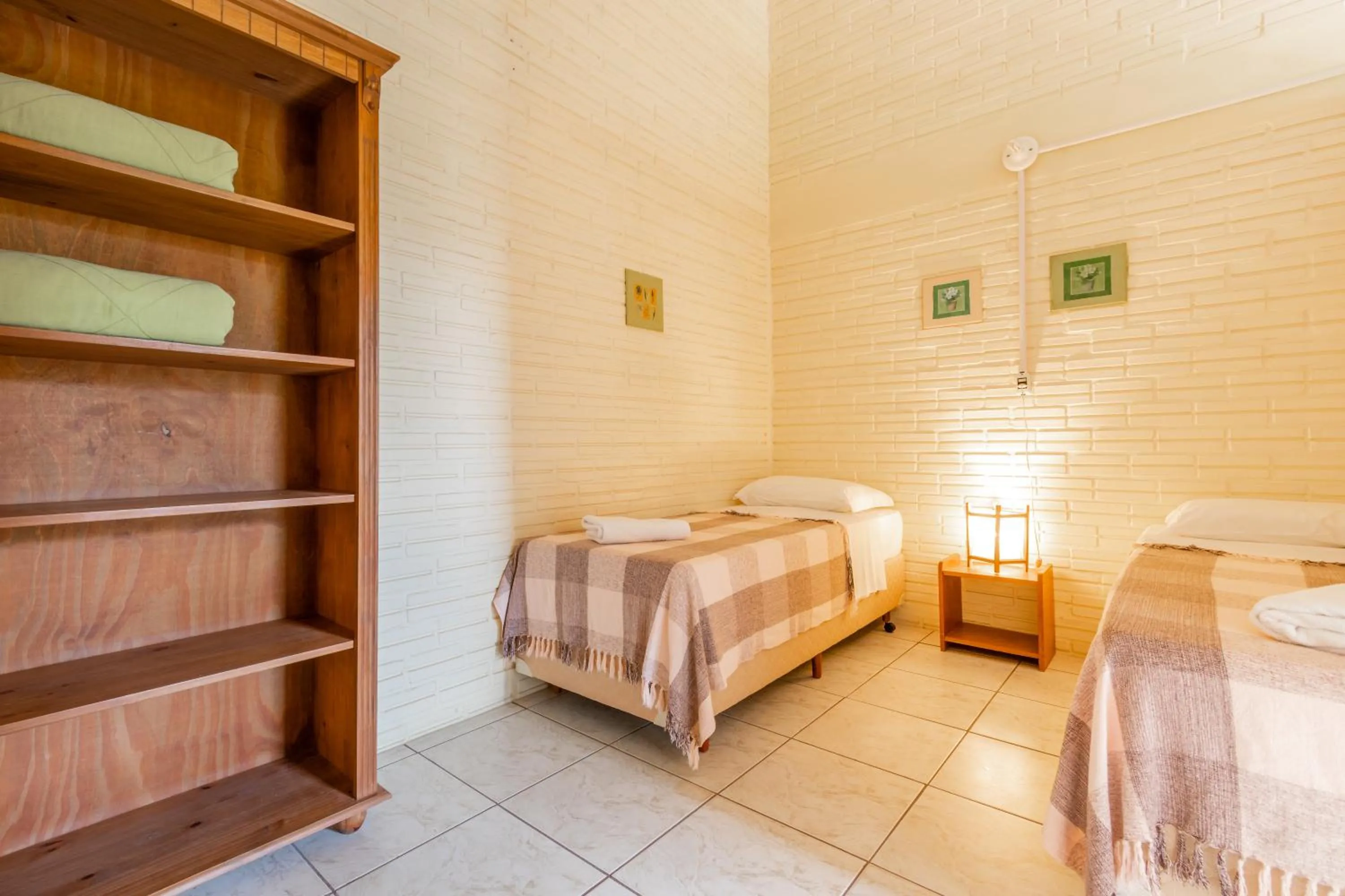 Bed in Pousada do Paraiso