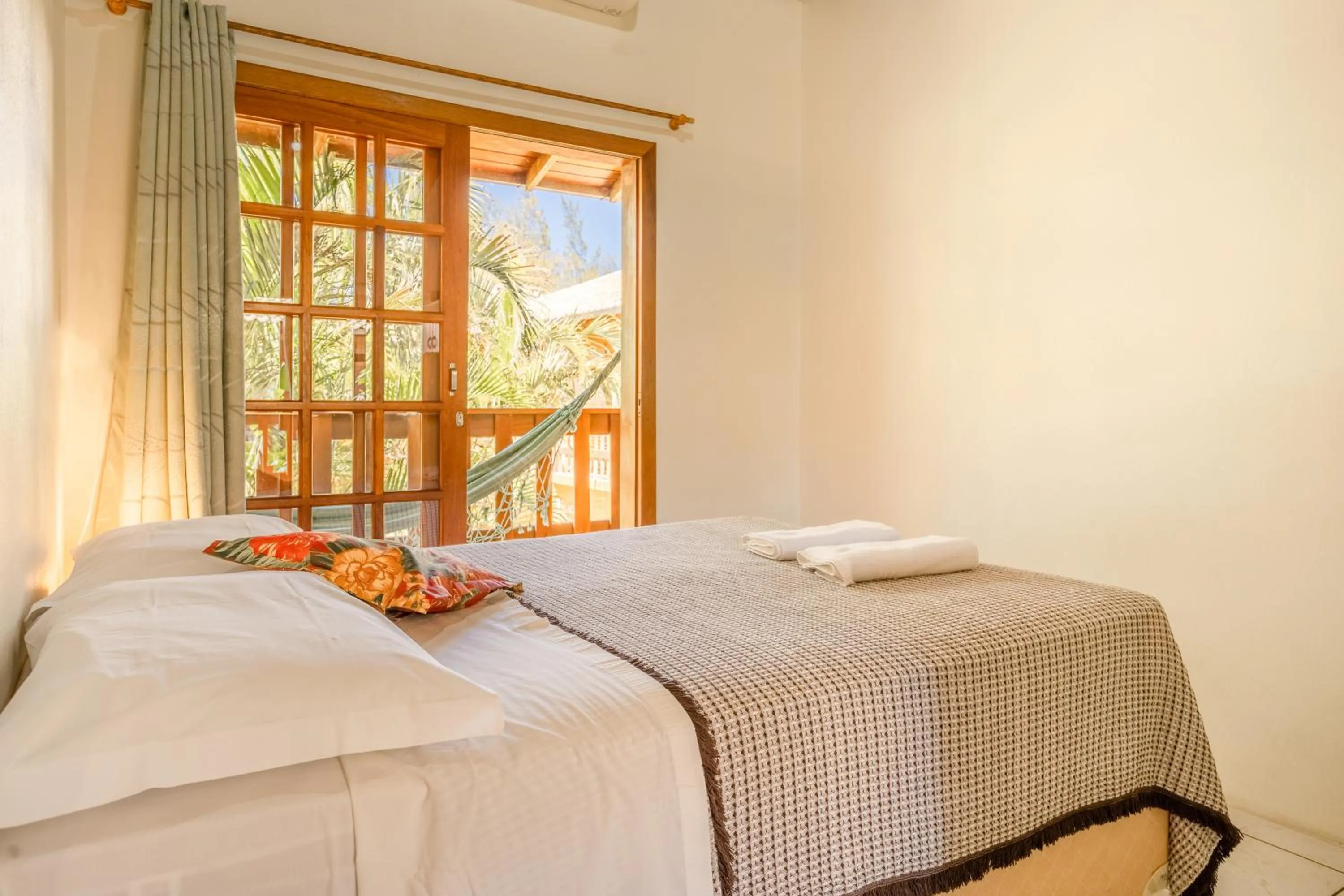 Bed in Pousada do Paraiso
