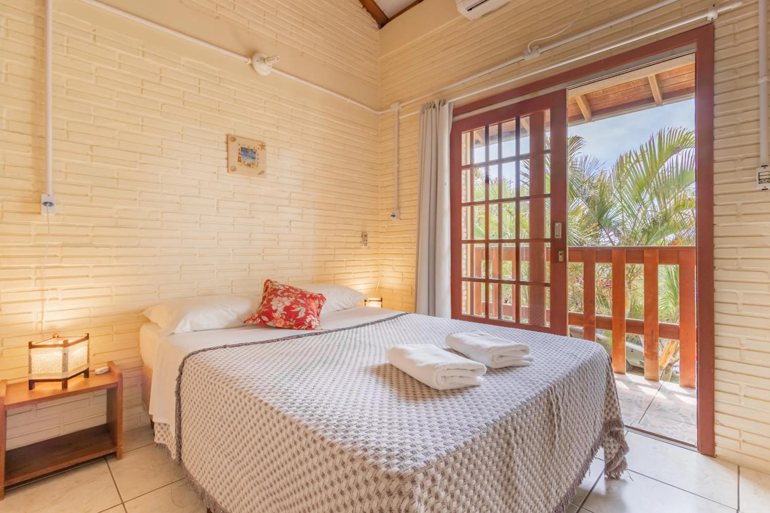 Bed in Pousada do Paraiso