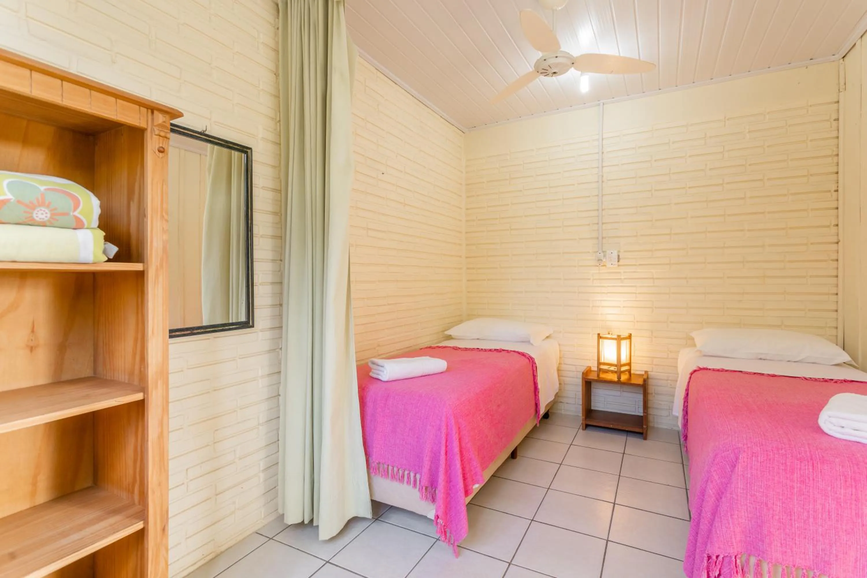 Bed in Pousada do Paraiso
