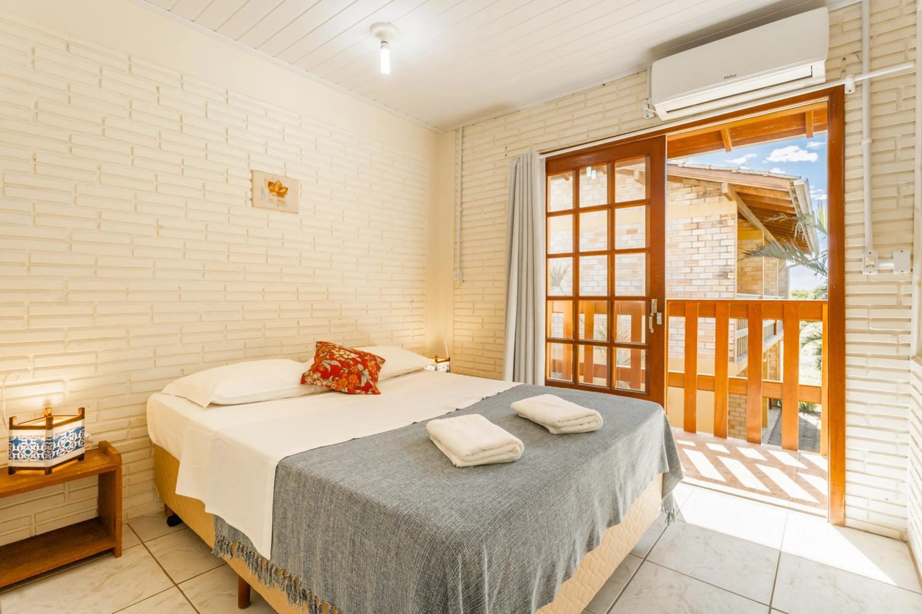 Bed in Pousada do Paraiso