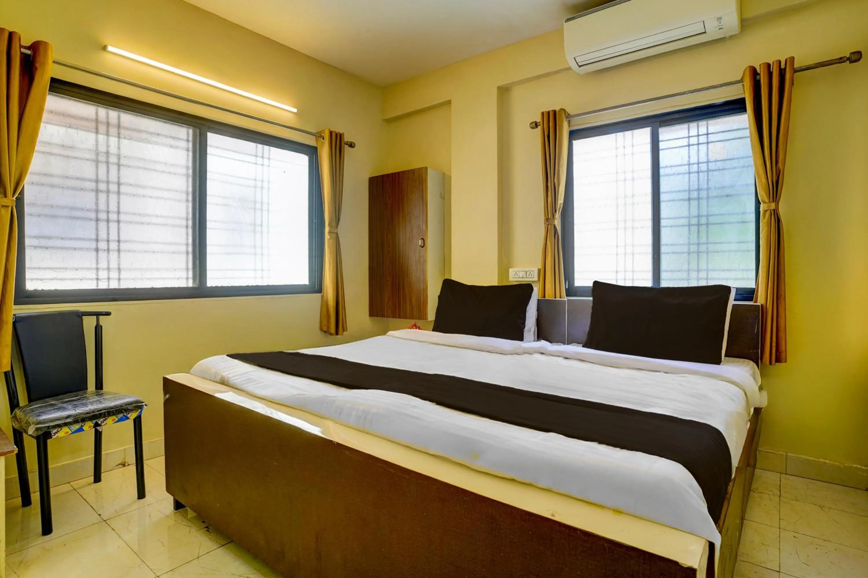 Bedroom, Bed in Hotel O Sainagar Shirdi Railway Junction Formerly Sai Vyankatesh Residency