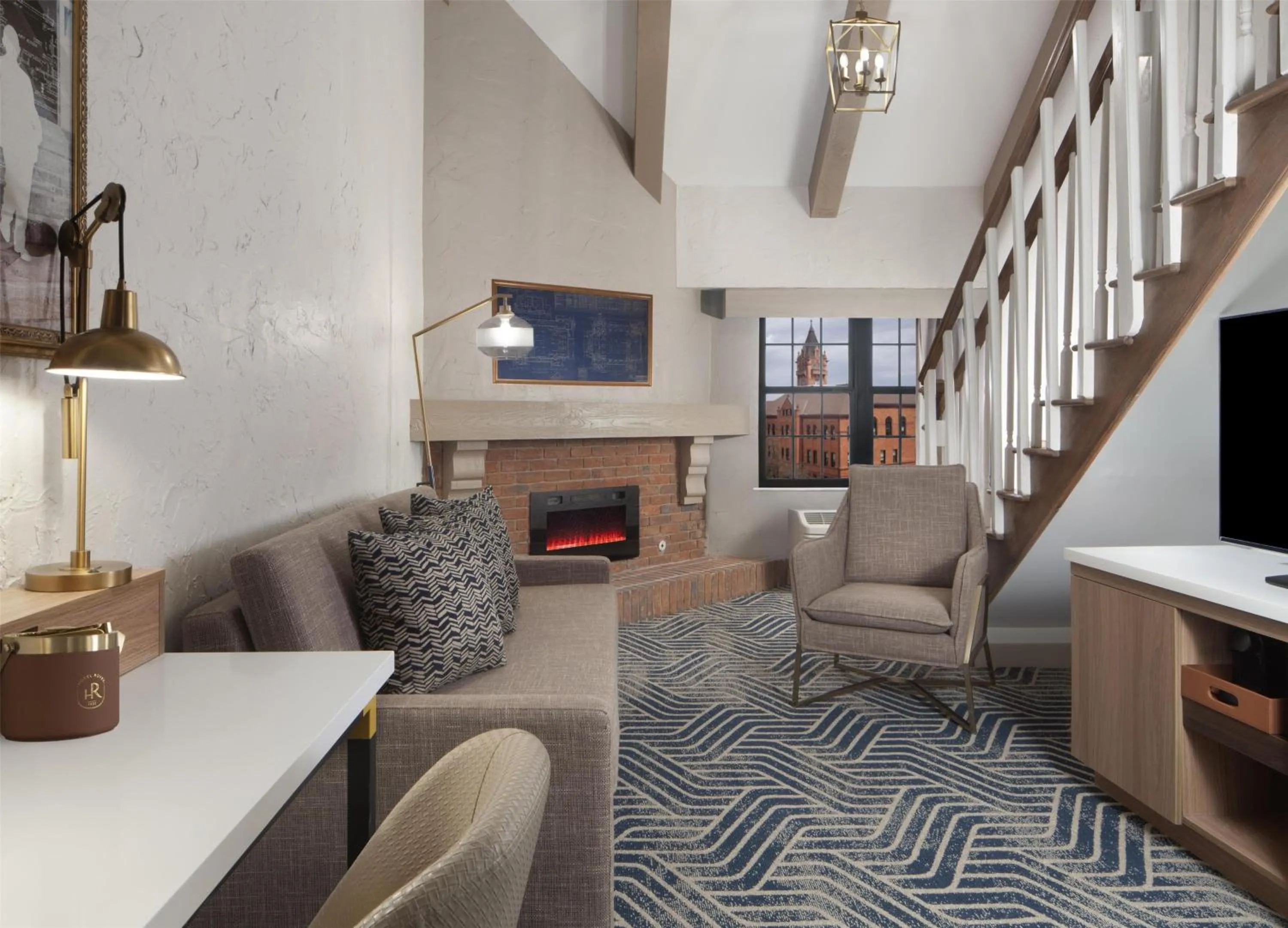 Living room in Hotel Royer Urbana Champaign, Tapestry Collection by Hilton