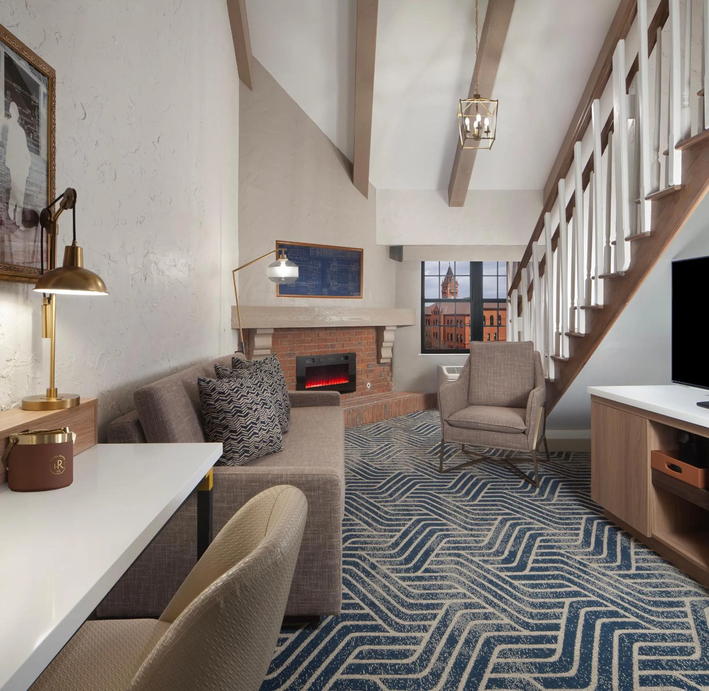 Living room in Hotel Royer Urbana Champaign, Tapestry Collection by Hilton