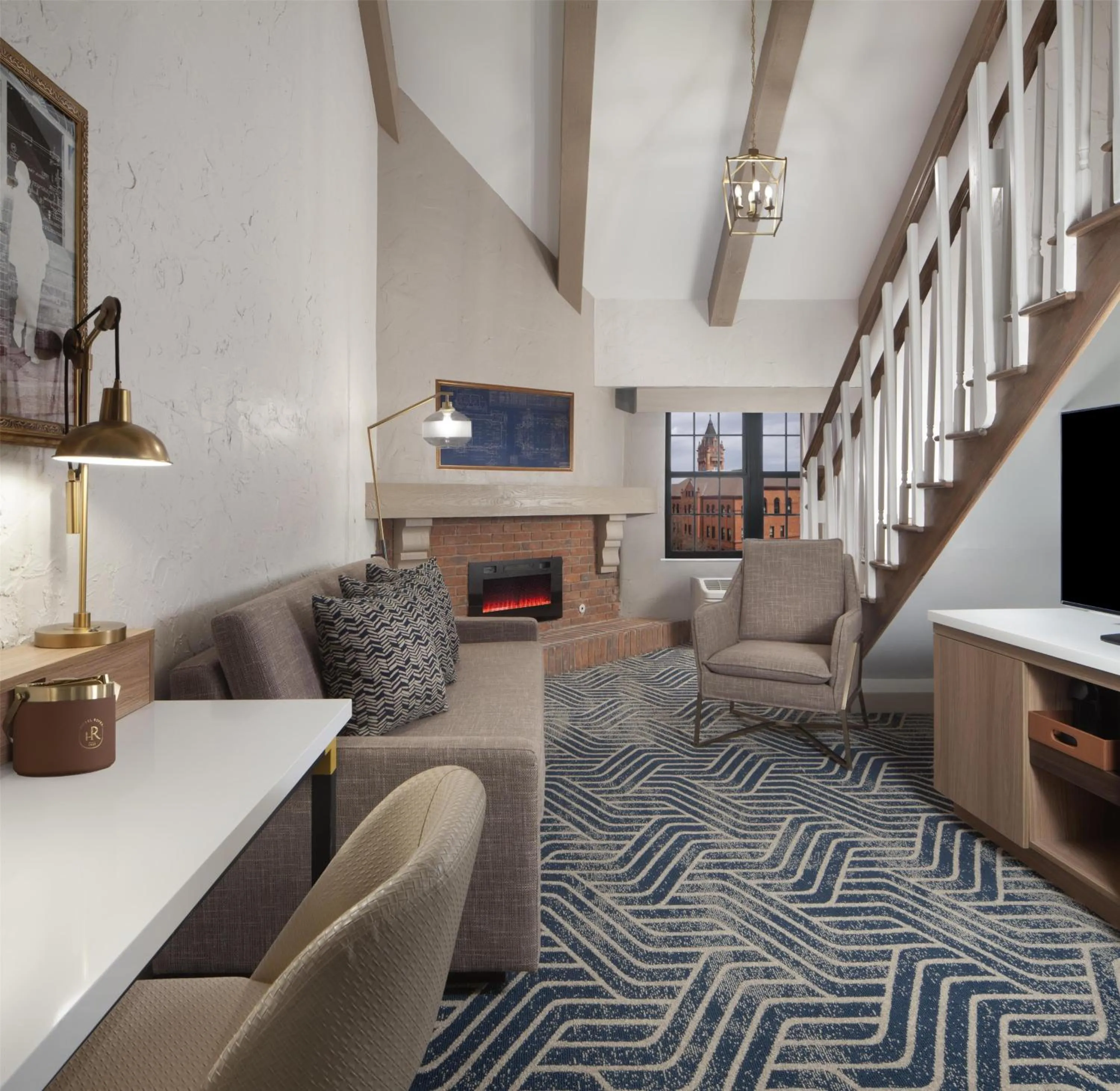 Living room in Hotel Royer Urbana Champaign, Tapestry Collection by Hilton