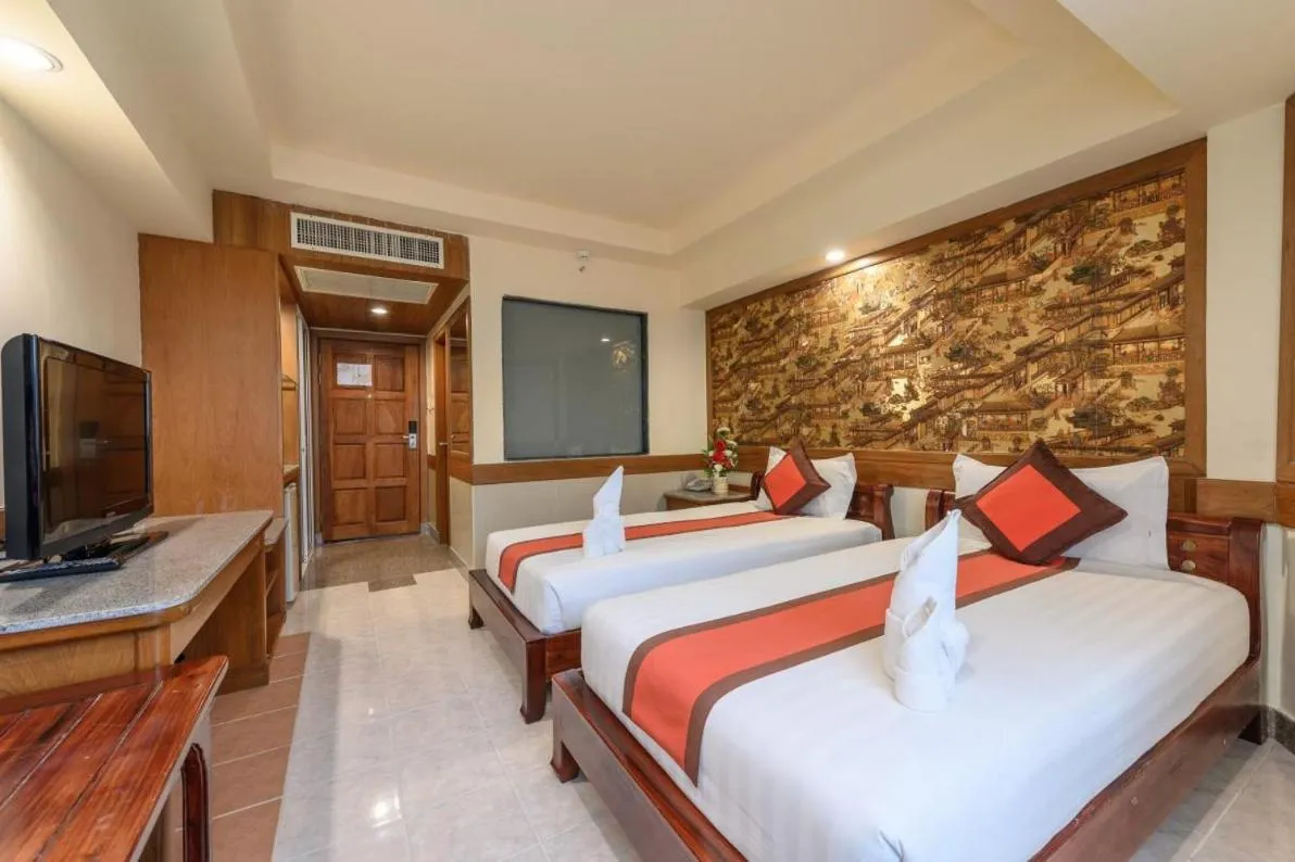 Bed in Boutique Paradise Hotel