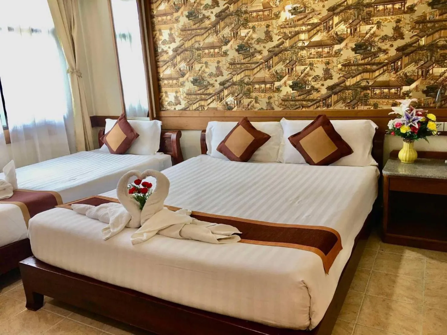 Bed in Boutique Paradise Hotel