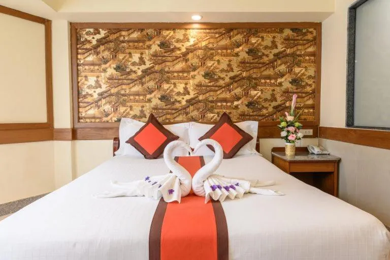 Bed in Boutique Paradise Hotel